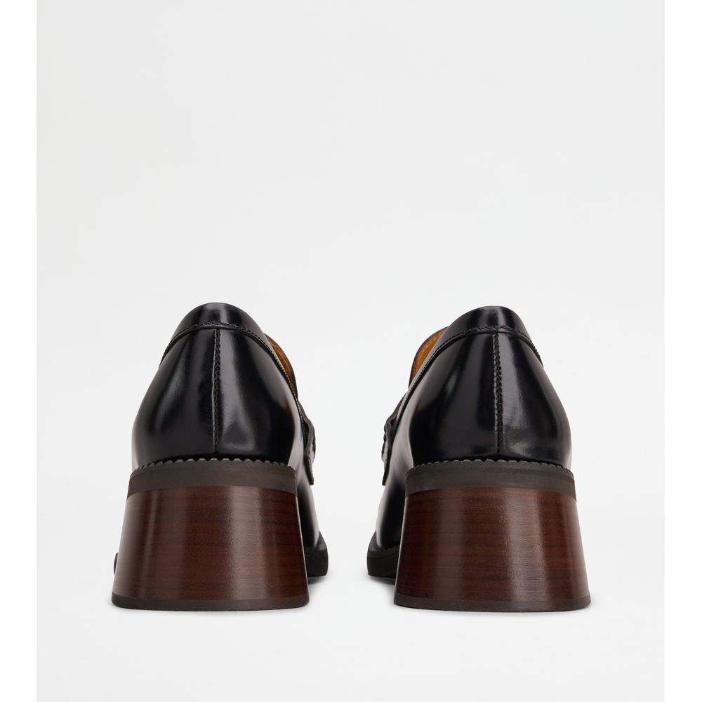 Tods Heeled Loafers In Leather Black Womens