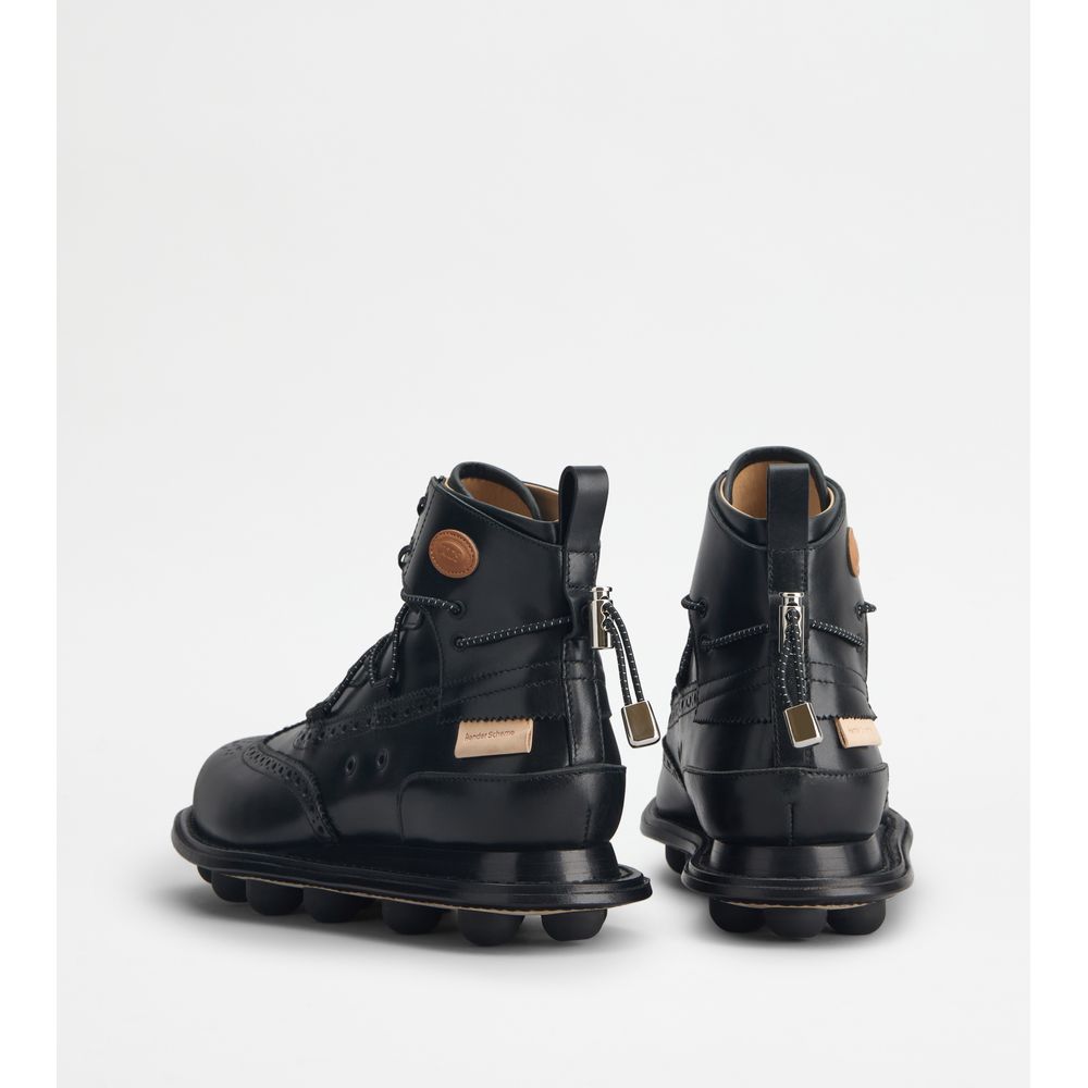 Tods Ankle Boots In Leather Nero Mens