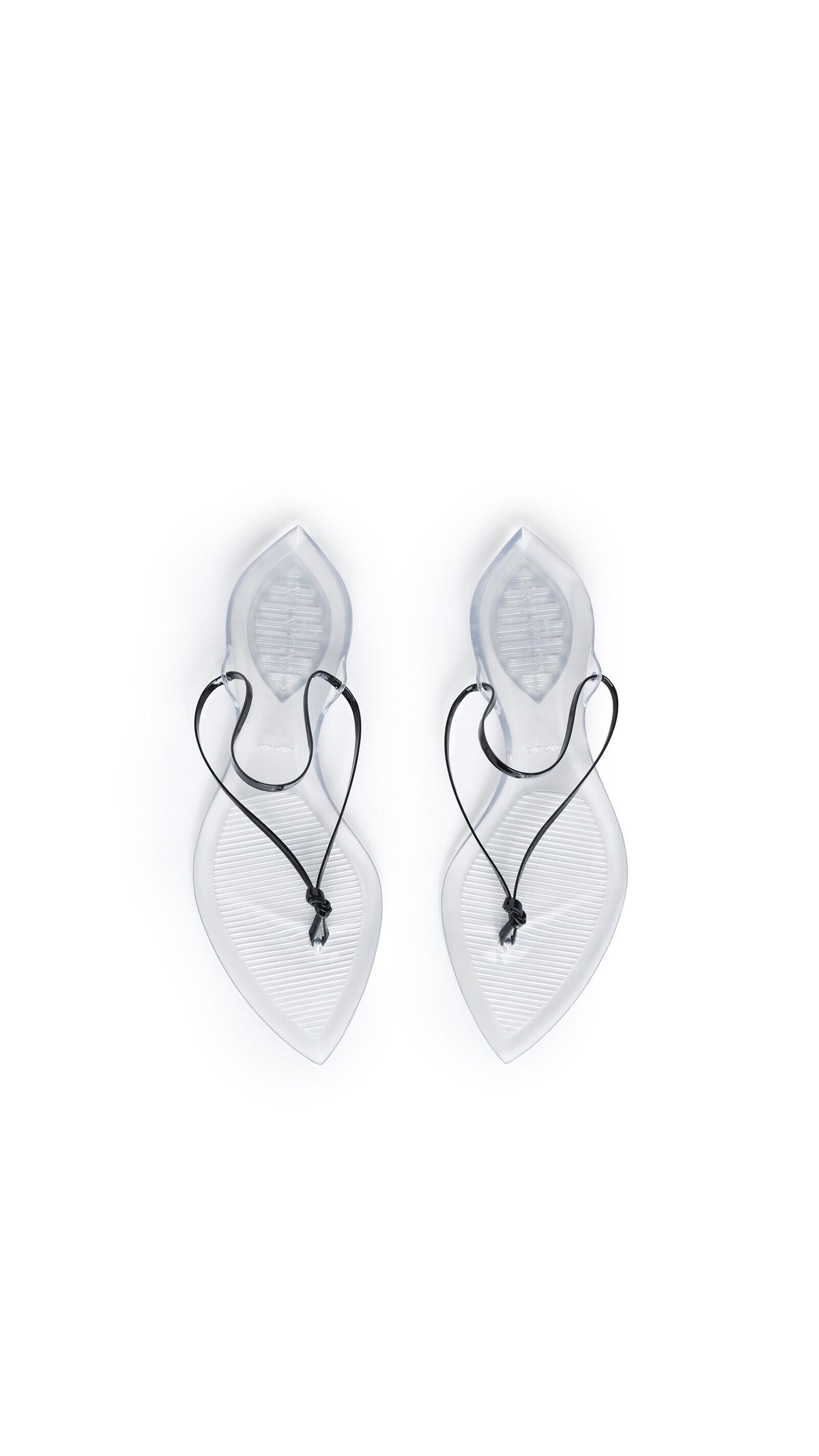 Alaïa Invisible Thong In Patent Leather