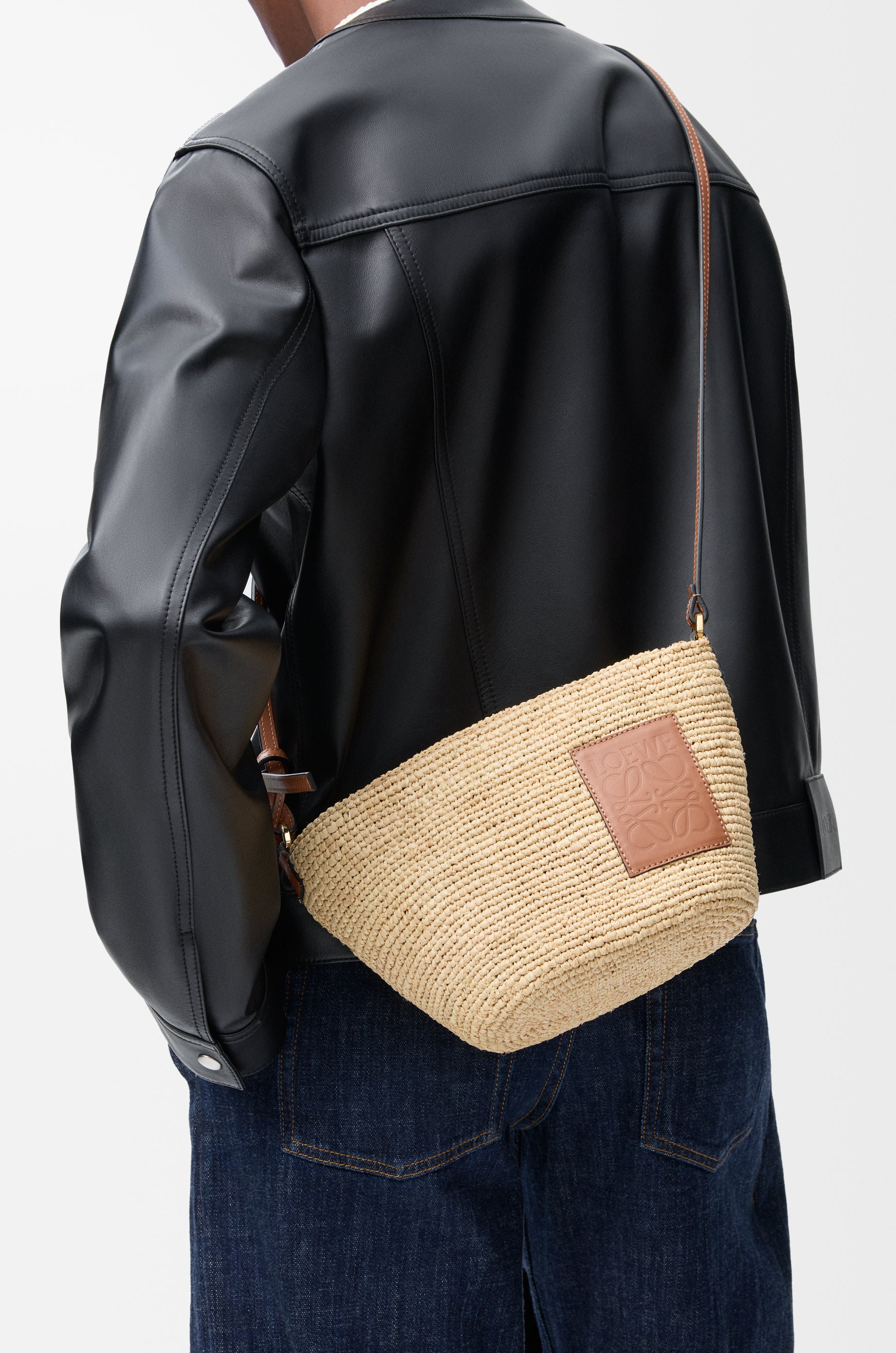 Loewe Slit pochette bag in raffia and calfskin