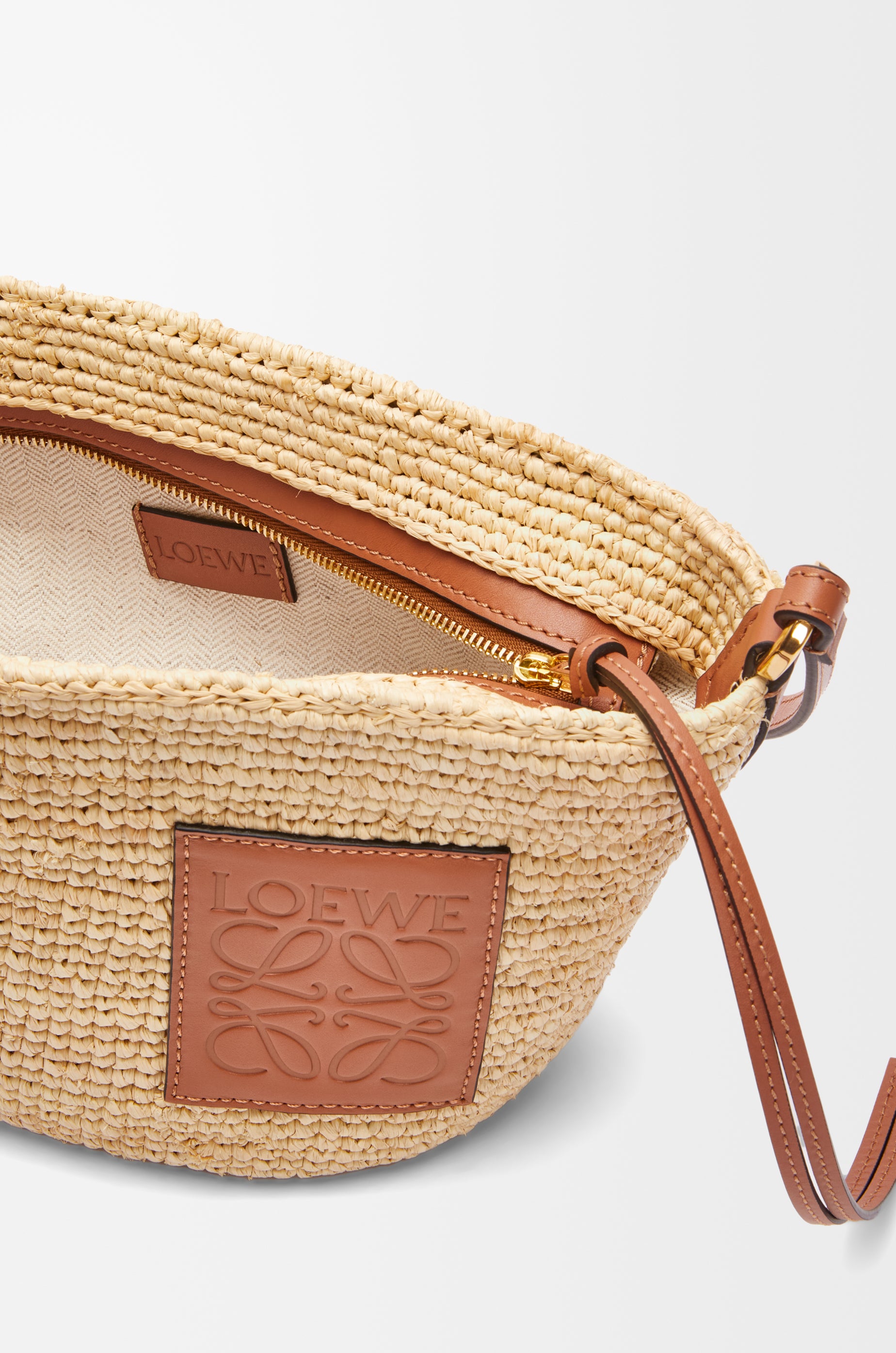 Loewe Slit pochette bag in raffia and calfskin