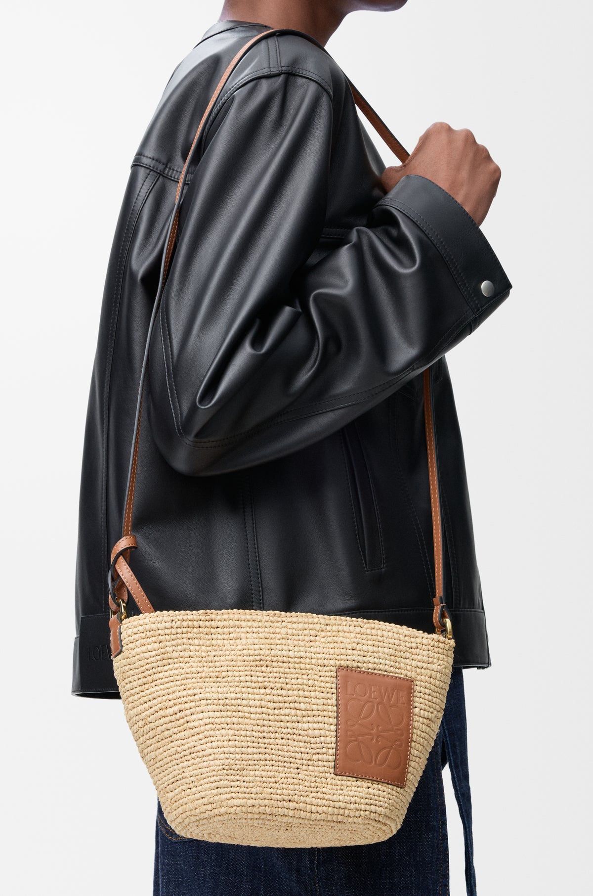 Loewe Slit pochette bag in raffia and calfskin
