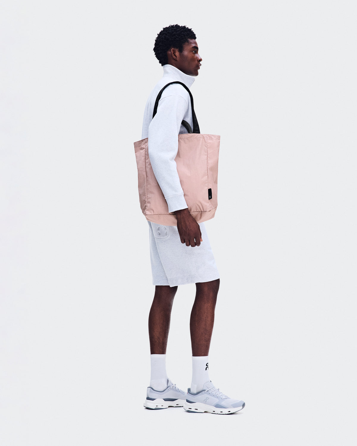 On Tote Pack 25L Biscuit | Black