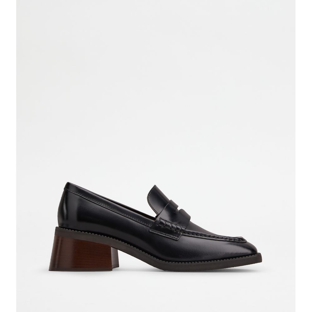 Tods Heeled Loafers In Leather Black Womens