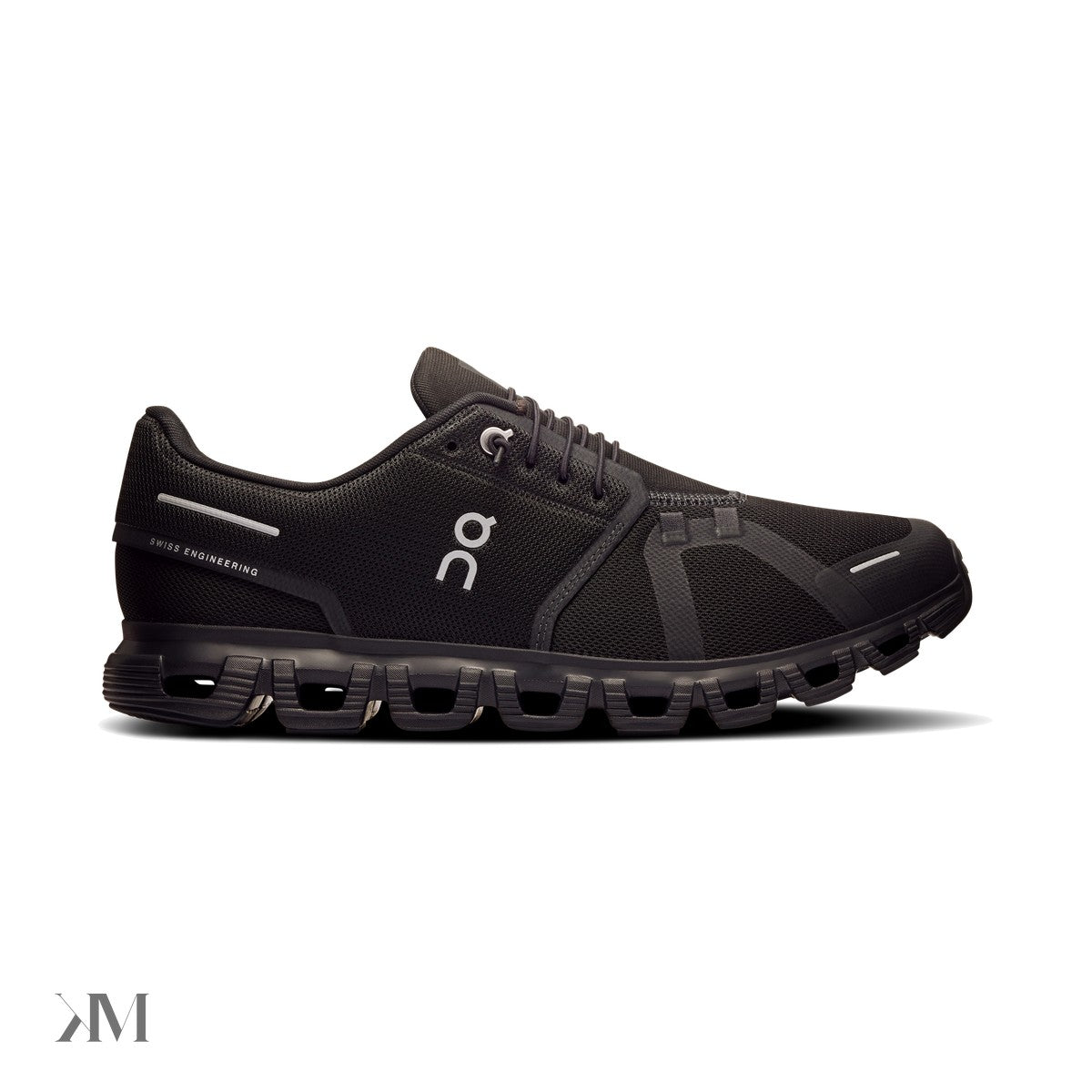 On Cloud 6 Black Black lateral view showing CloudTec outsole pods and mesh upper, India