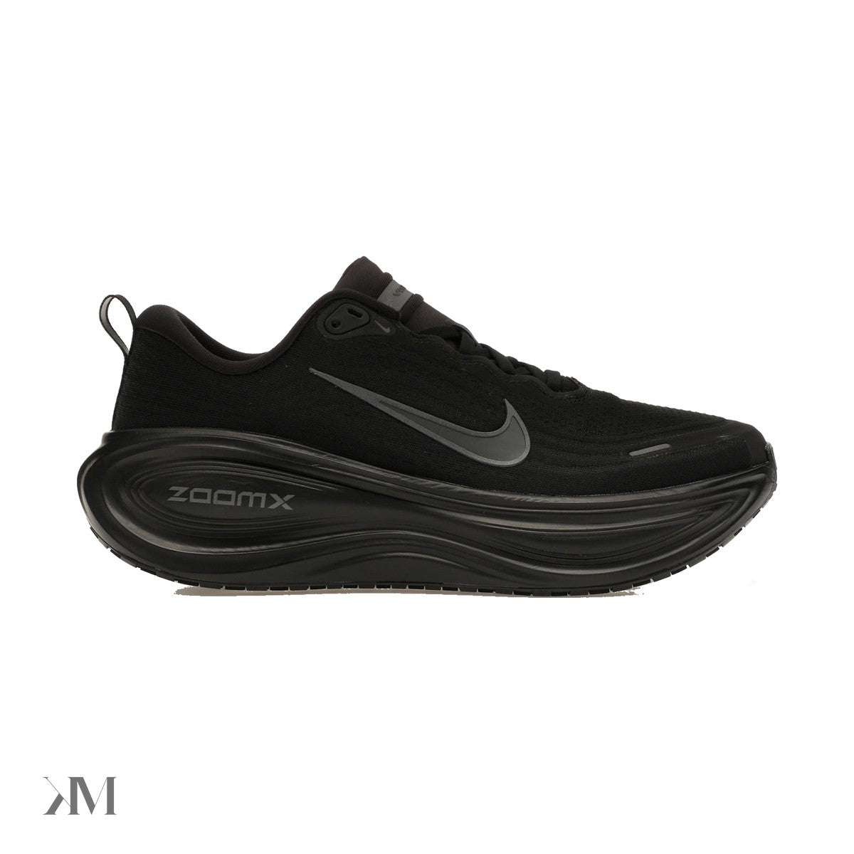 Nike Vomero Plus Black side profile showing full-length ZoomX foam midsole and mesh upper