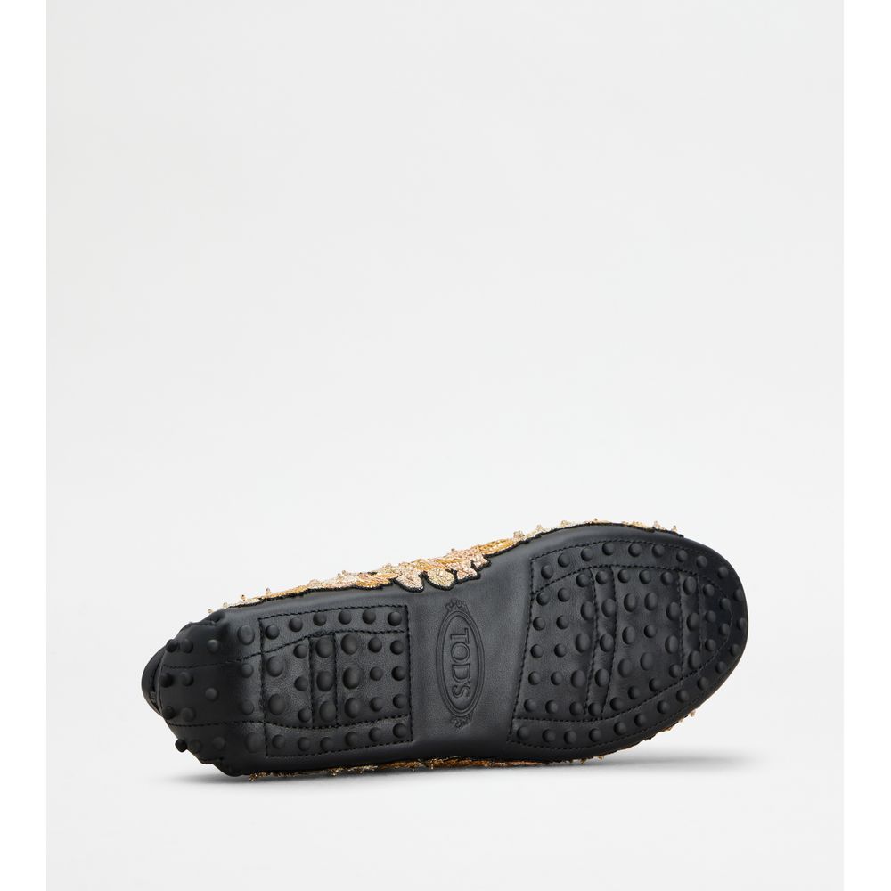 Tods T Timeless Gommino Driving Shoes In Leather Black Gold Womens