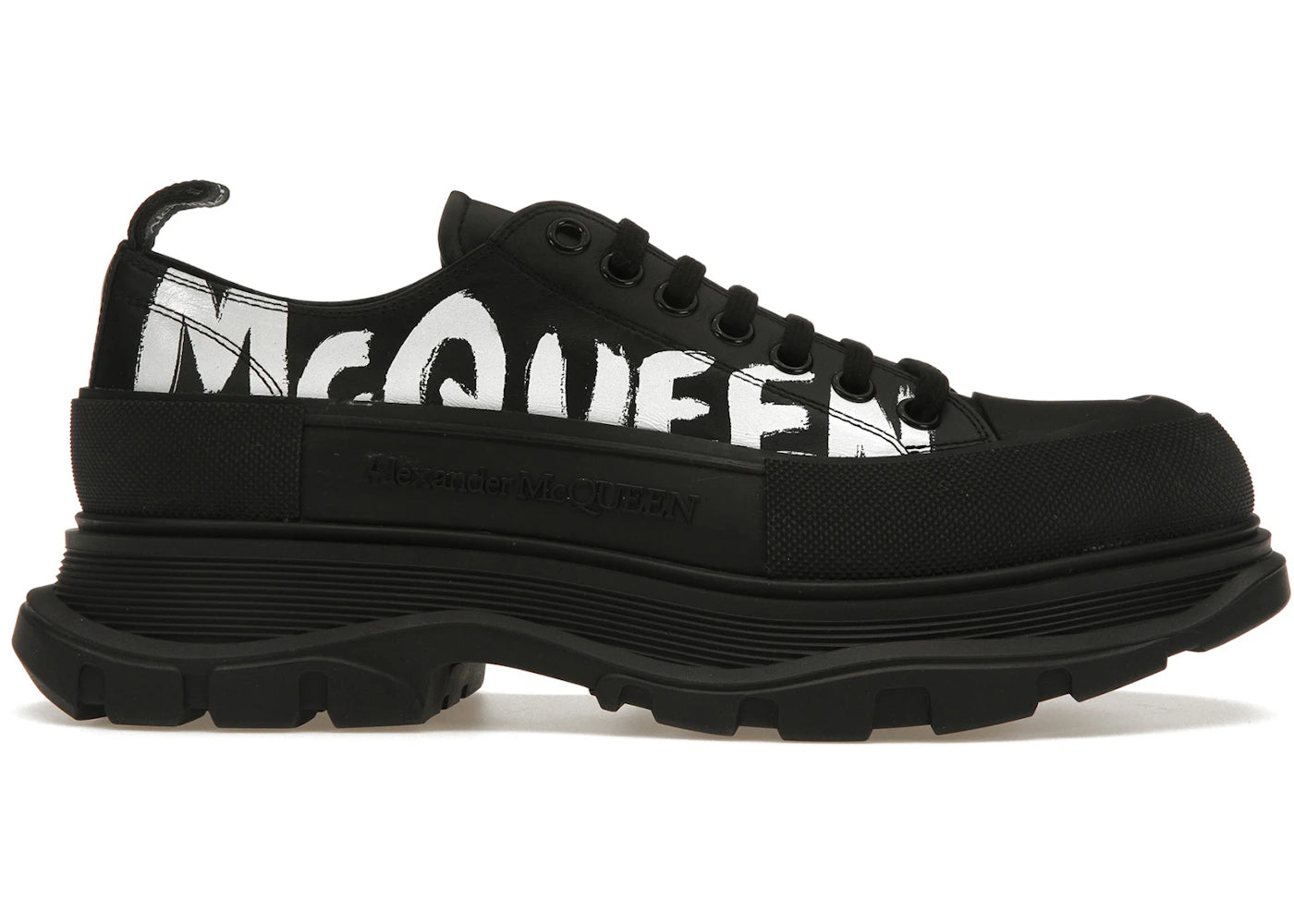 alexander mcqueen tread slick low lace up graffiti black black white