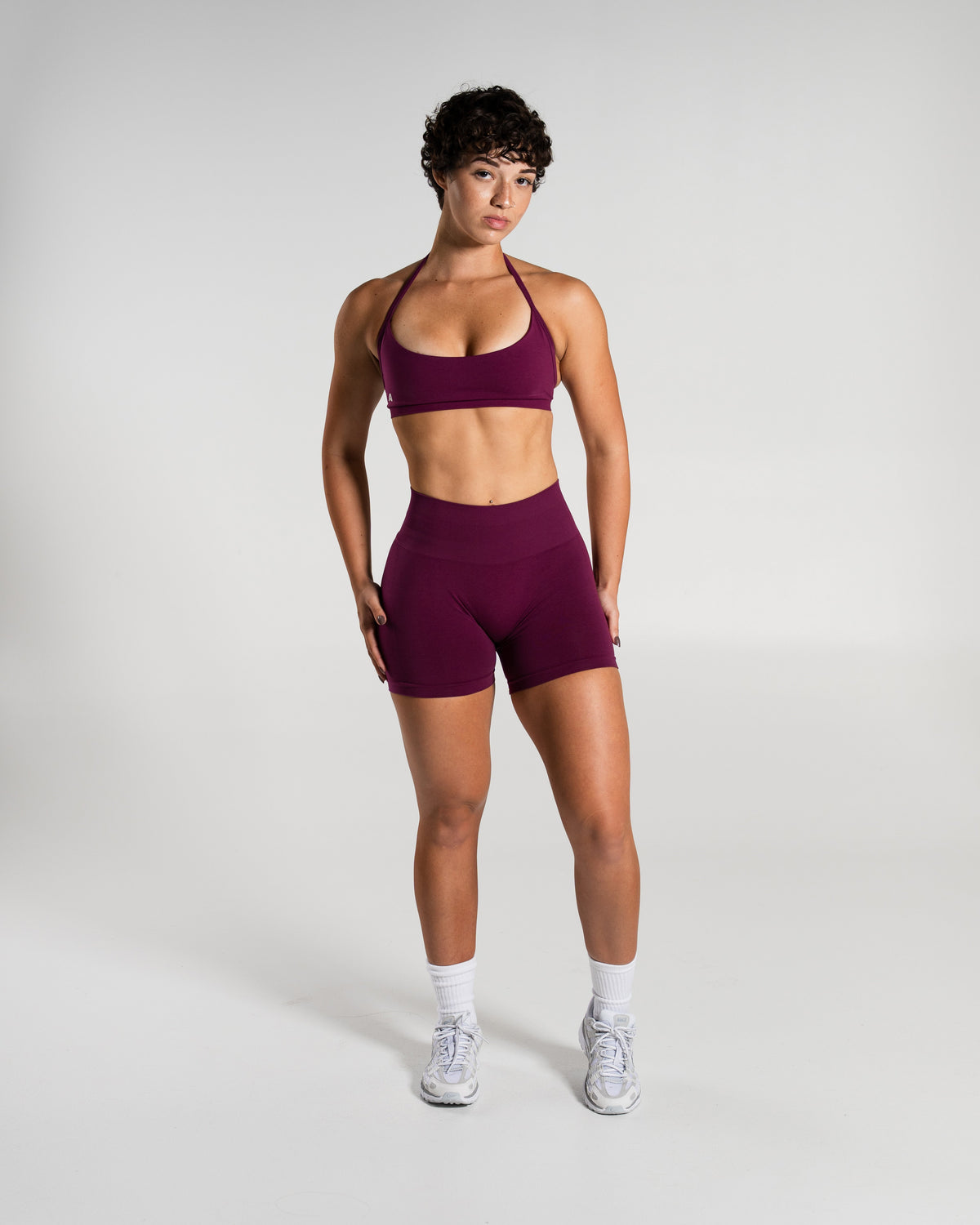 Alphalete Women's Amplify Mid Rise Short