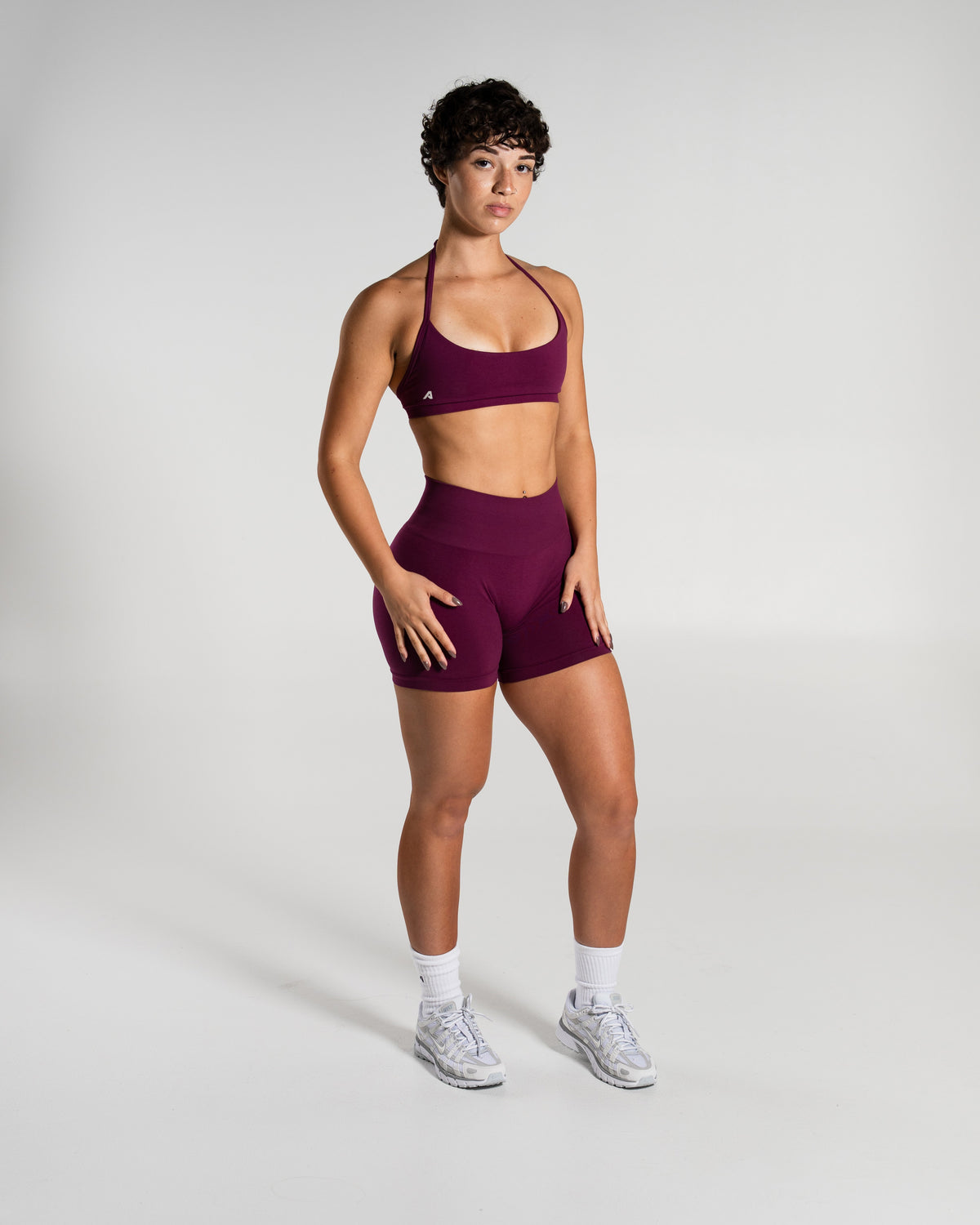 Alphalete Women's Amplify Mid Rise Short