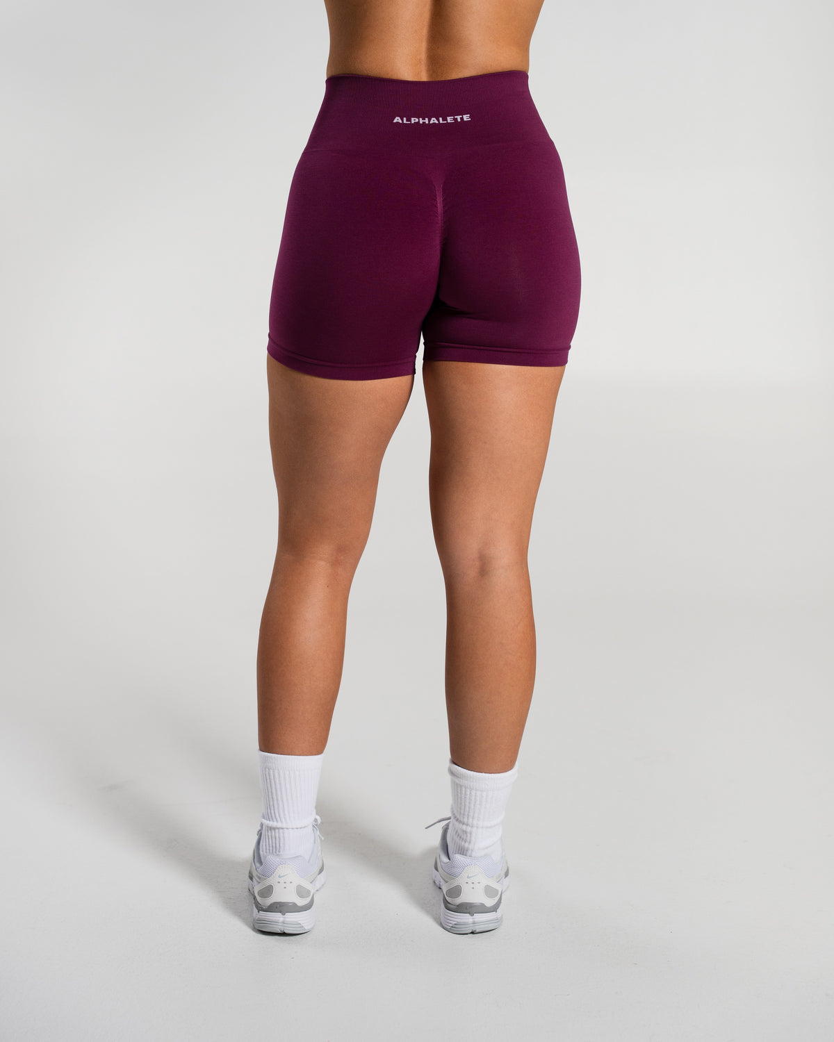 Alphalete Women's Amplify Mid Rise Short