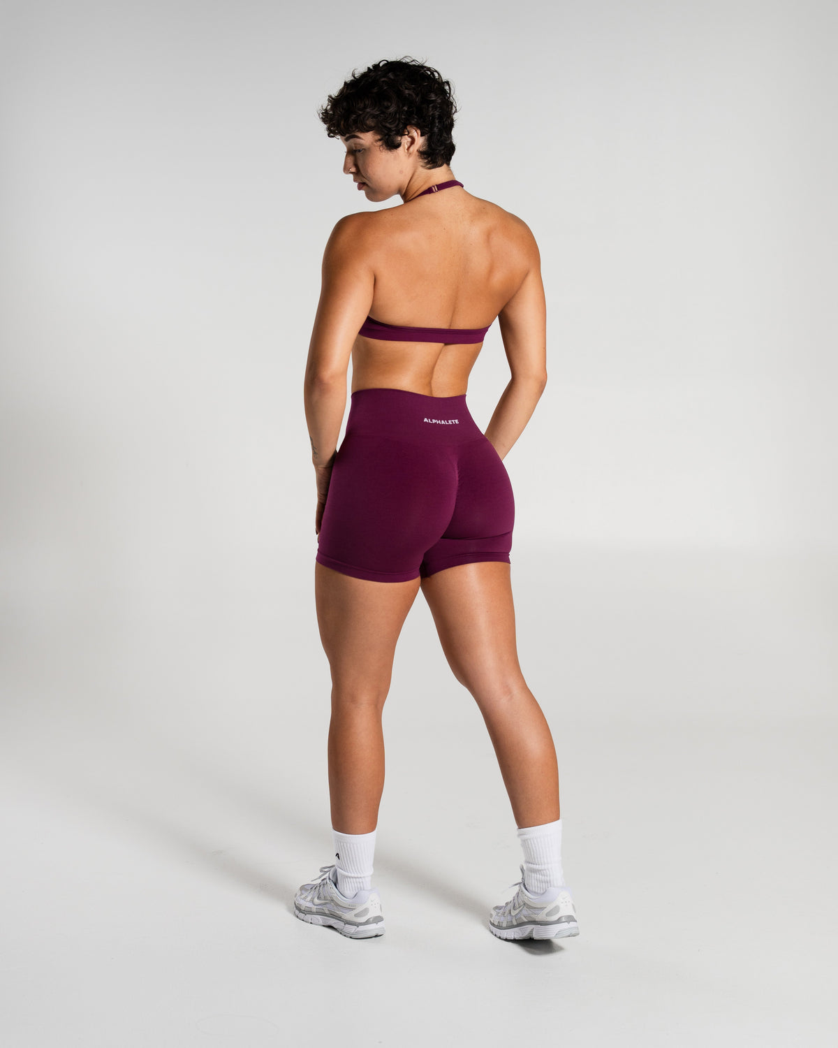 Alphalete Women's Amplify Mid Rise Short