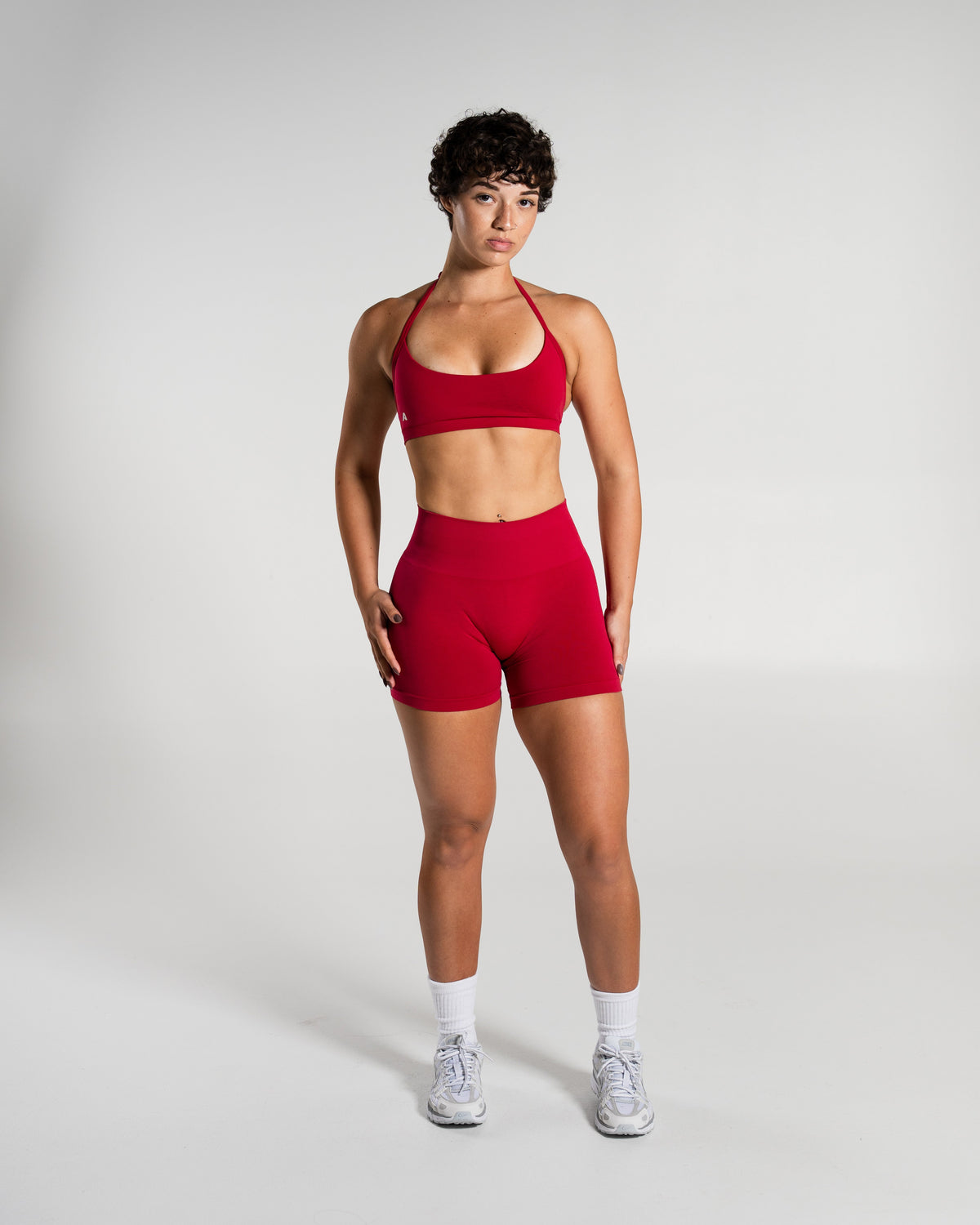 Alphalete Women's Amplify Mid Rise Short