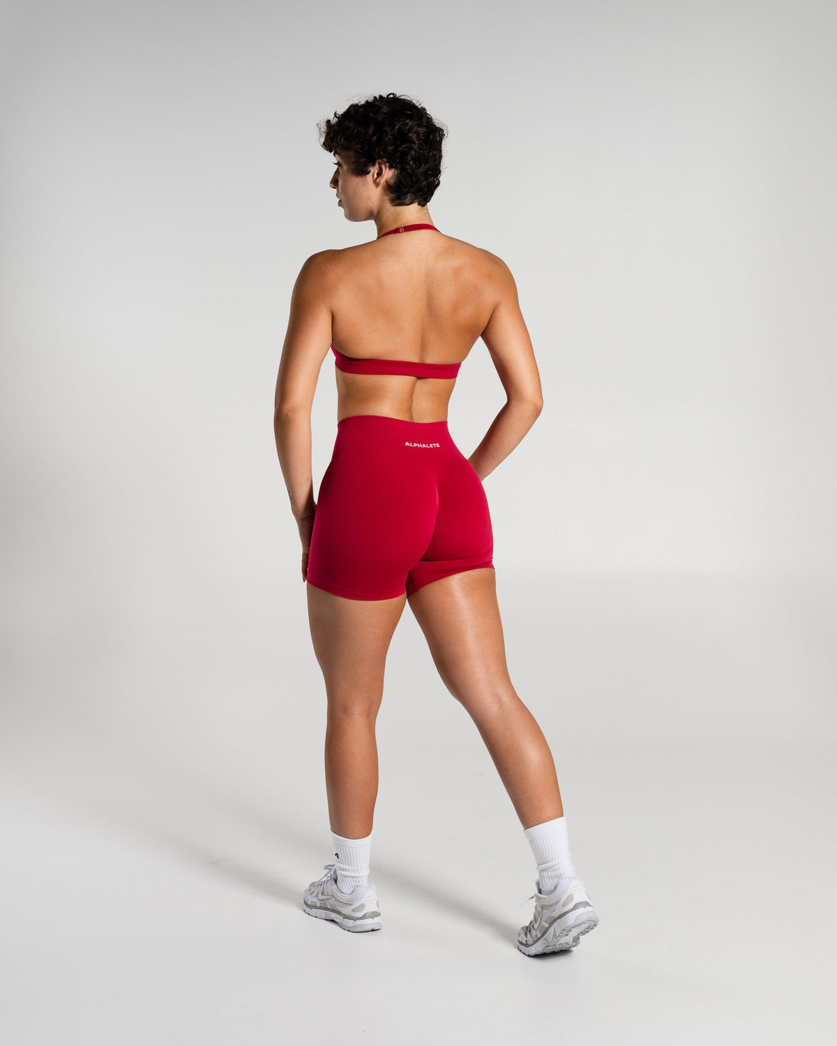 Alphalete Women's Amplify Mid Rise Short