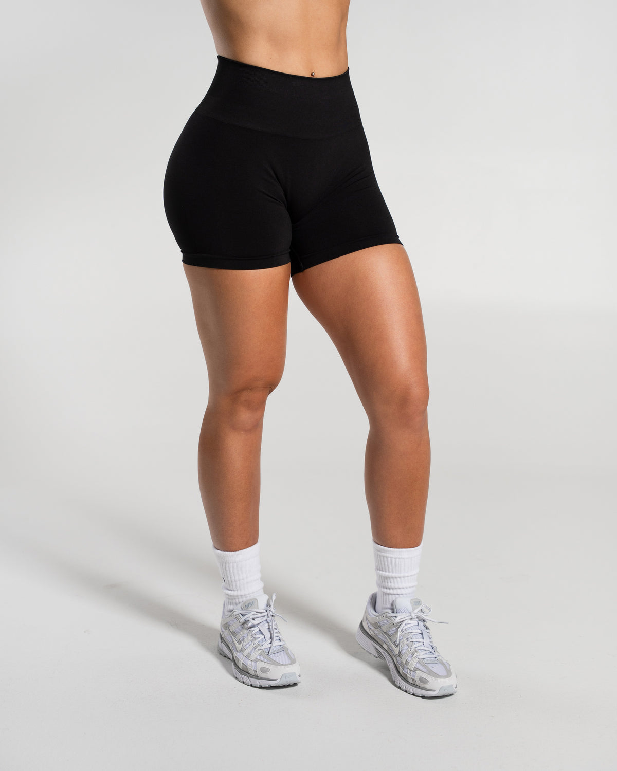 Alphalete Women's Amplify Mid Rise Short