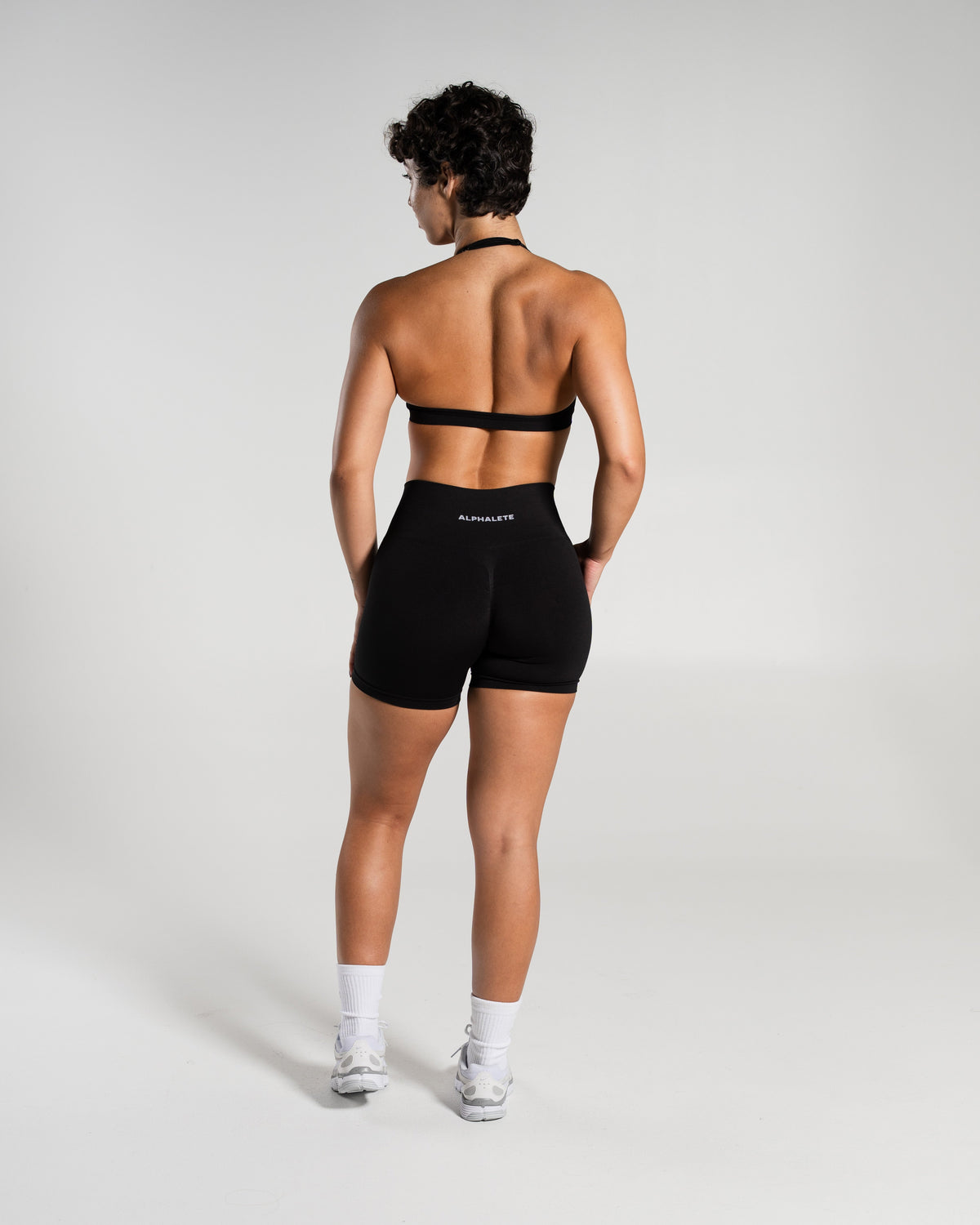 Alphalete Women's Amplify Mid Rise Short