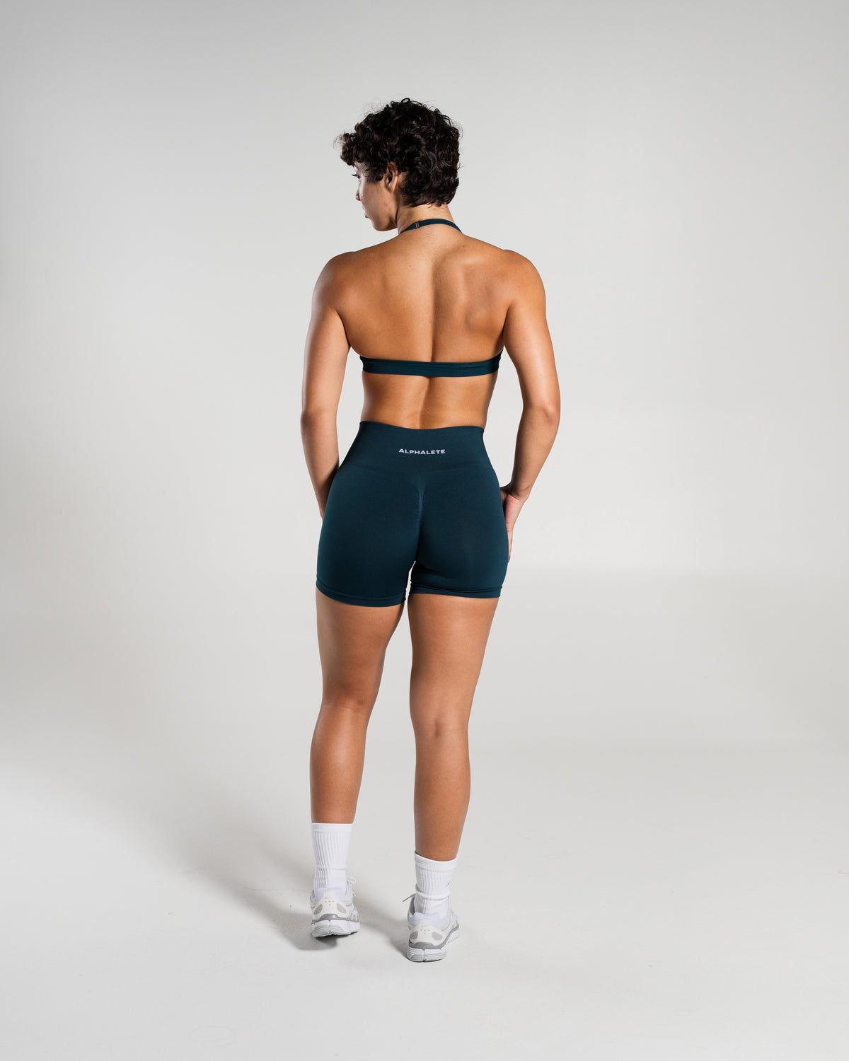 Alphalete Women's Amplify Mid Rise Short