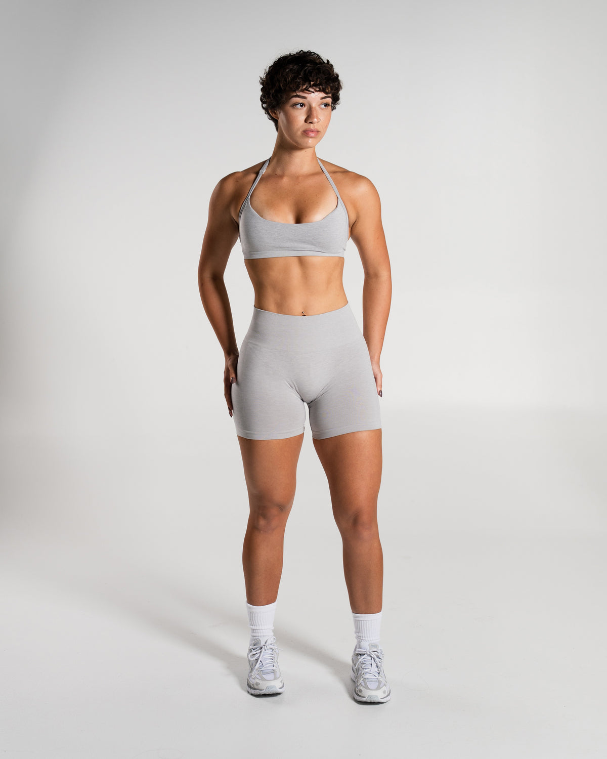 Alphalete Women's Amplify Mid Rise Short