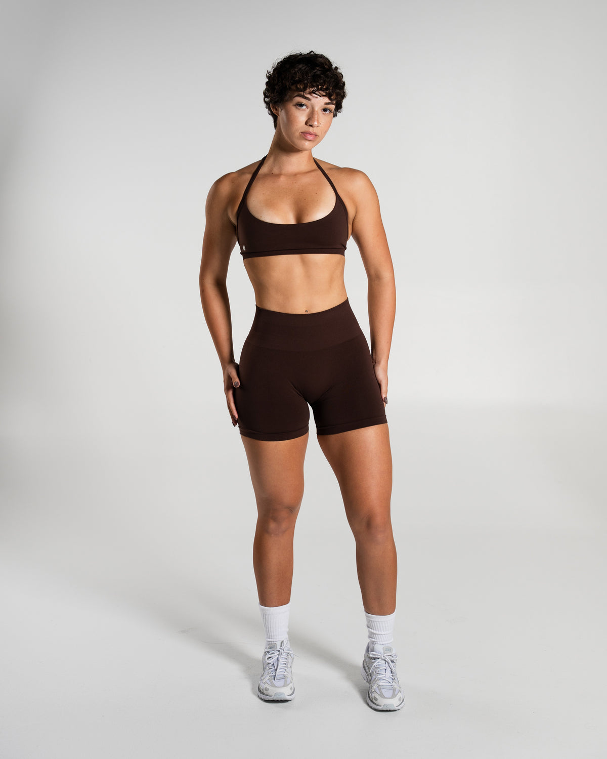 Alphalete Women's Amplify Mid Rise Short