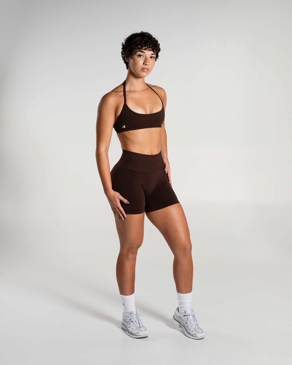 Alphalete Women's Amplify Mid Rise Short