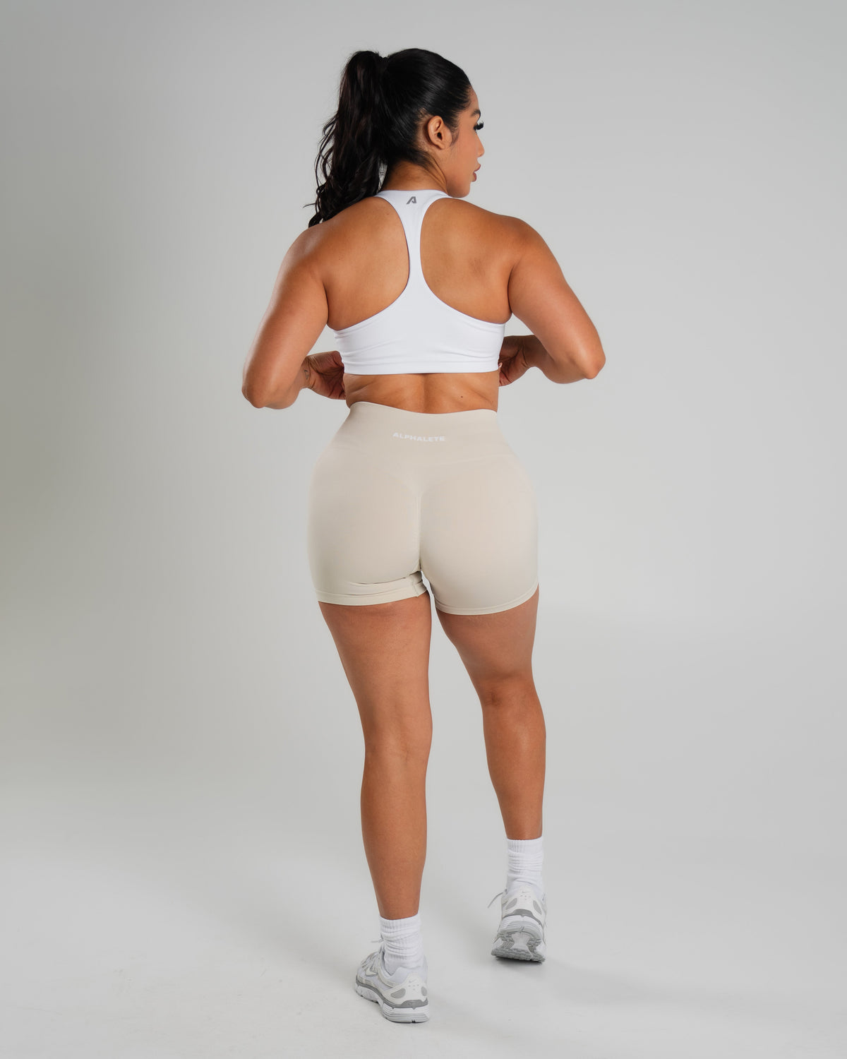 Alphalete Women's Amplify Mid Rise Short
