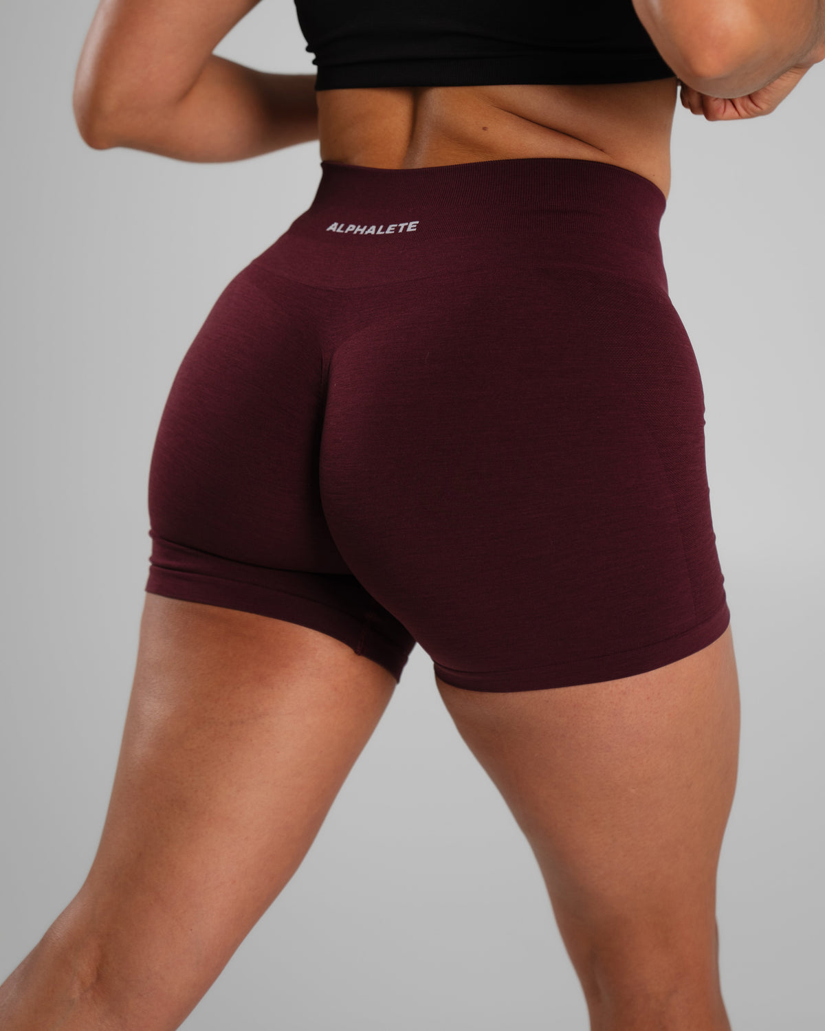 Alphalete Women's Amplify Mid Rise Short