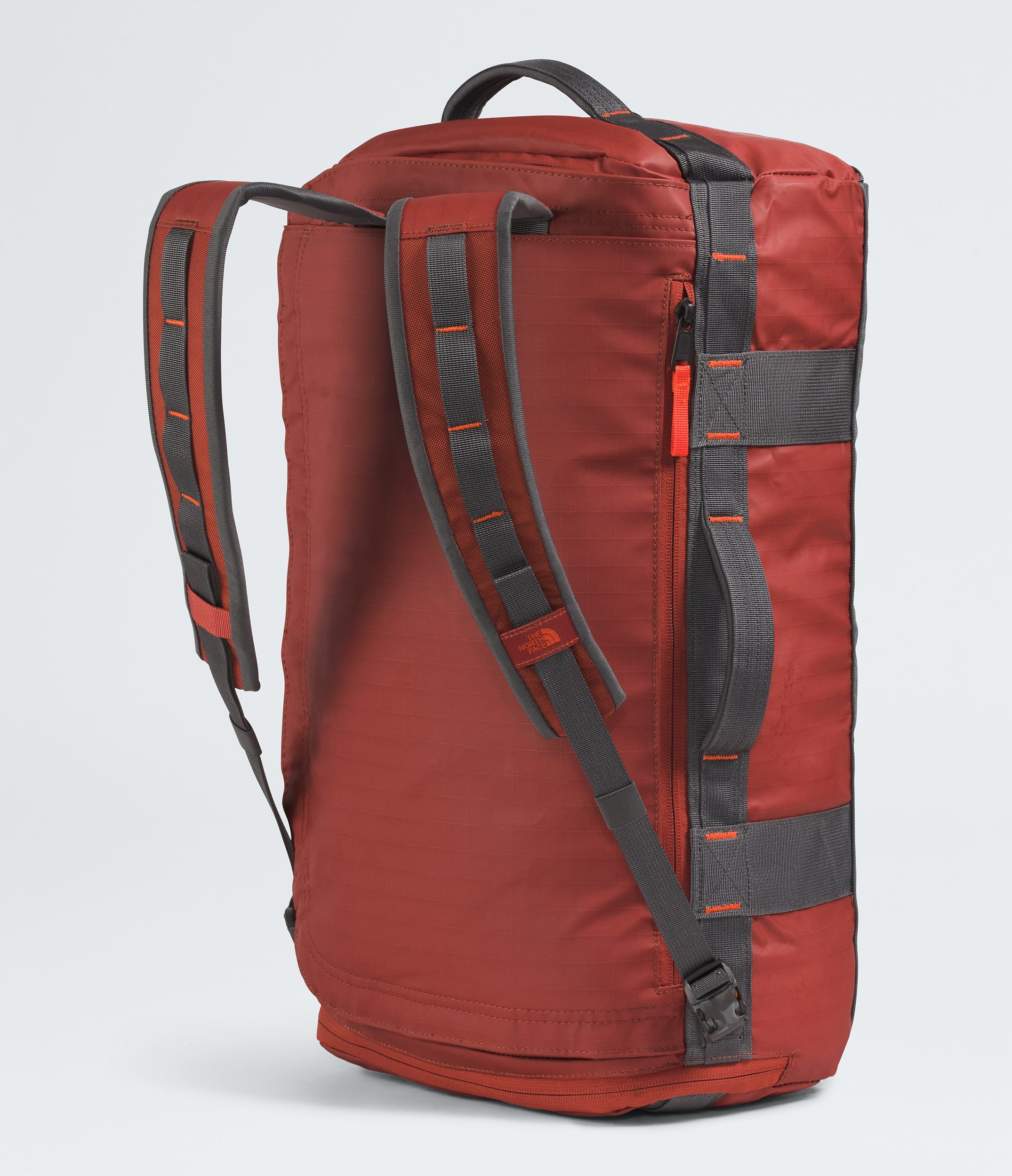 The North Face Base Camp™ Voyager Duffel—32L Iron Clay-Anthracite Grey-Lava Red