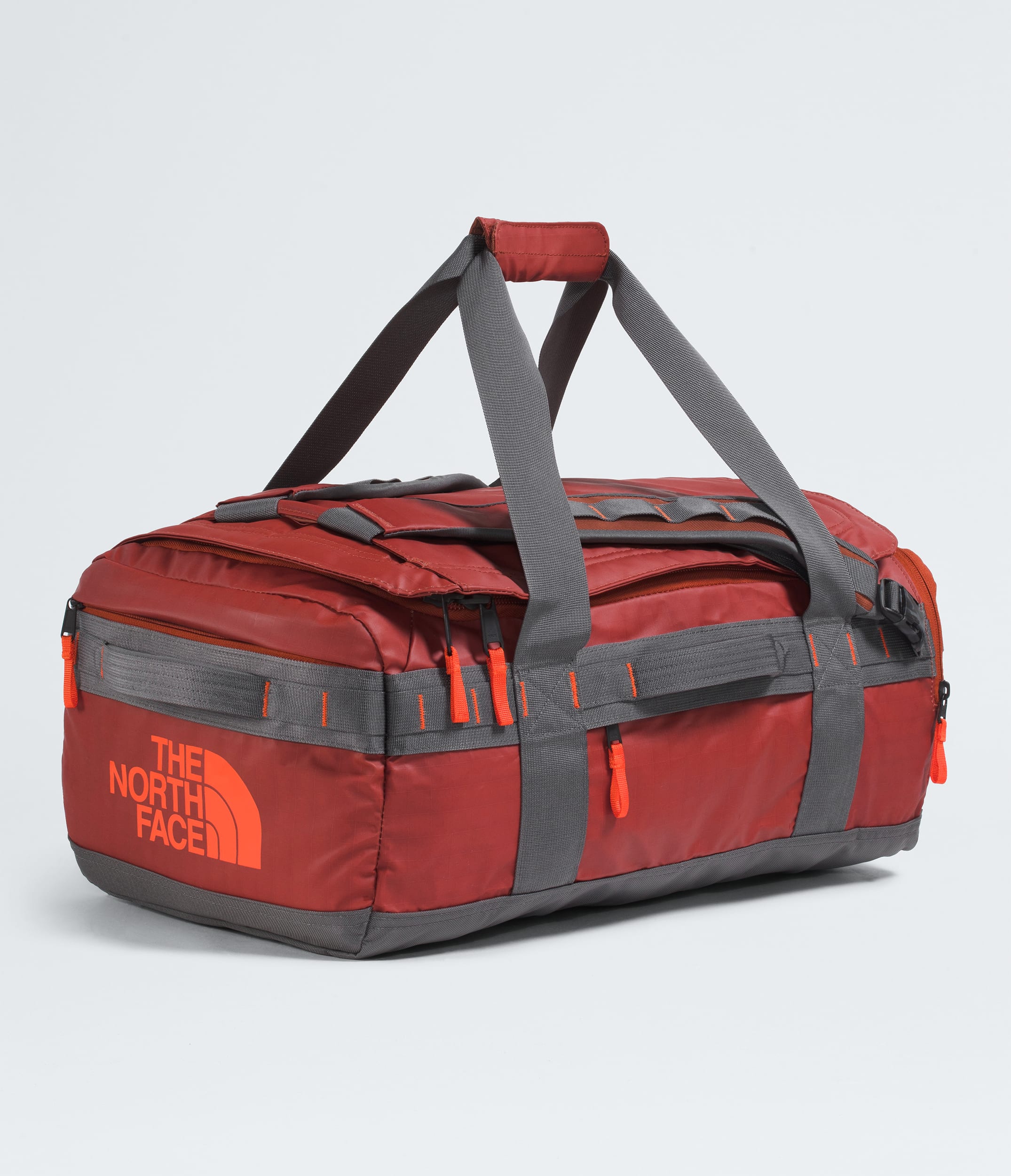 The North Face Base Camp™ Voyager Duffel—42L Iron Clay-Anthracite Grey-Lava Red