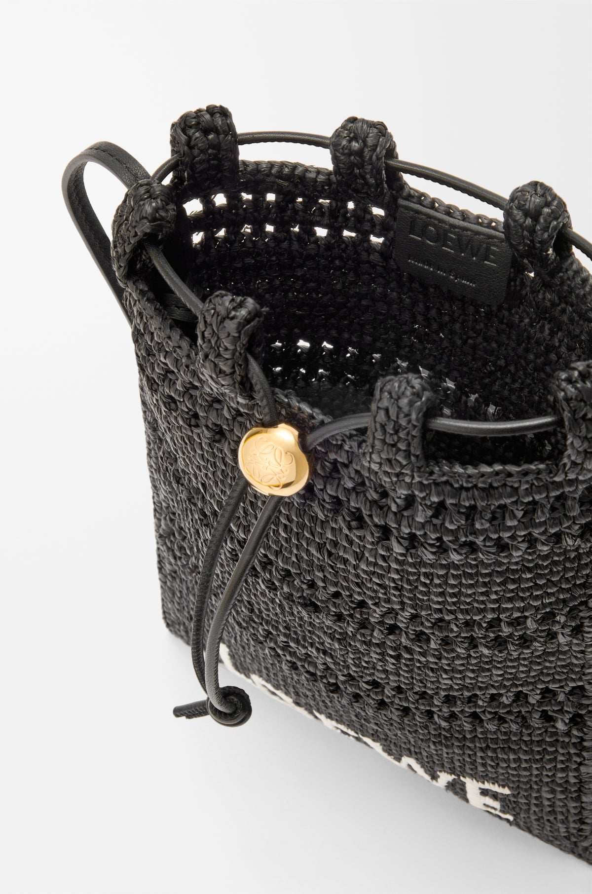 Loewe Drawstring pocket in raffia