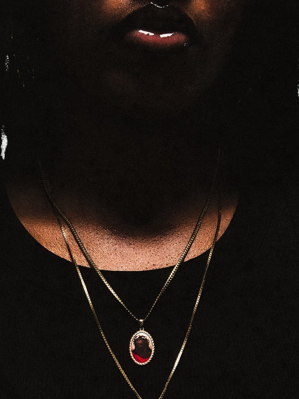 Denim Tears Black Jesus Pendant