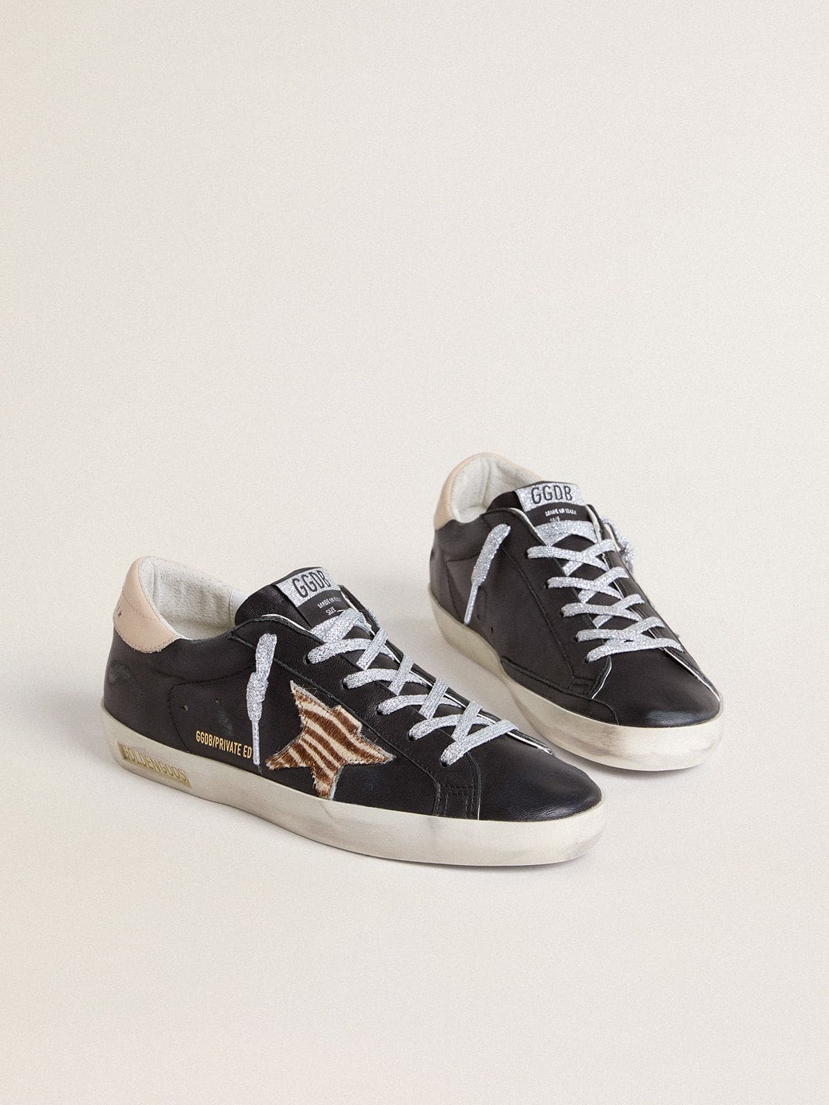 Golden Goose Womens Super-Star In Black Nappa Leather With Zebra-Print Pony Skin Star And Beige Leather Heel Tab Womens