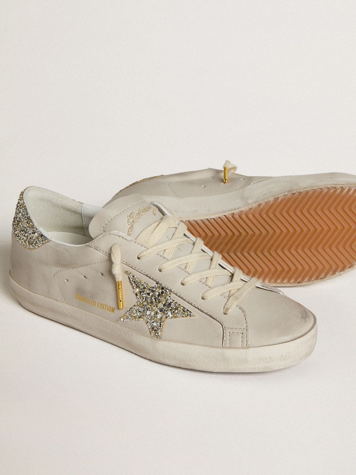Golden Goose Womens Super-Star In Ivory Nappa Leather With Platinum Glitter Star And Heel Tab Womens