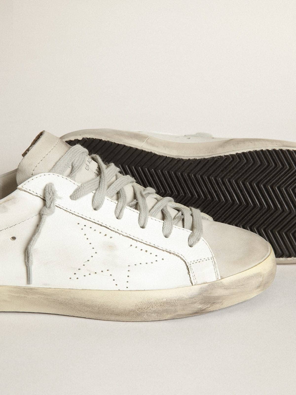 Golden Goose Womens Super-Star In White Leather With Perforated Star And Beige Nubuck Heel Tab Womens