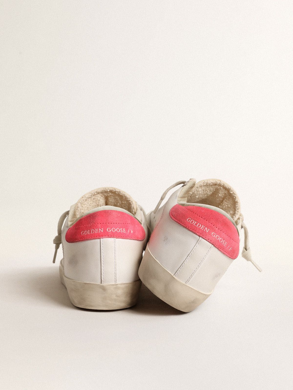 Golden Goose Womens White Leather Super-Star With Perforated Star And Fuchsia Nylon Heel Tab Womens