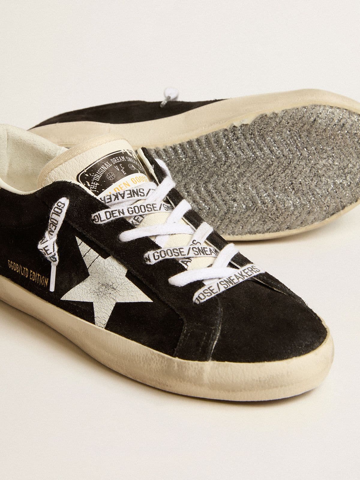Golden Goose Womens Super-Star Ltd In Black Suede With White Printed Star And Silver Glitter Heel Tab Womens