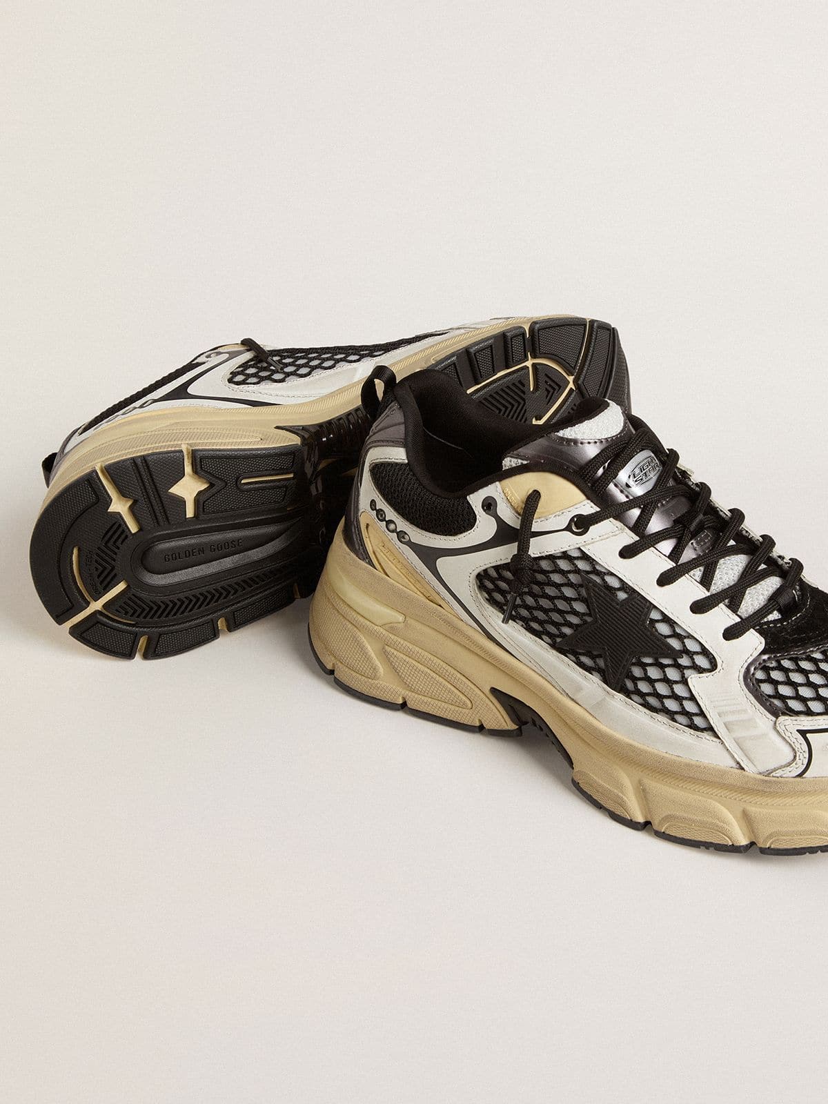 Golden Goose Womens Lightstar In White Leather And Black Mesh With Black Tpu Star Womens
