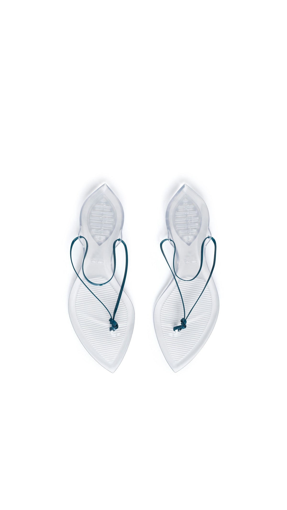 Alaïa Invisible Thong In Patent Leather