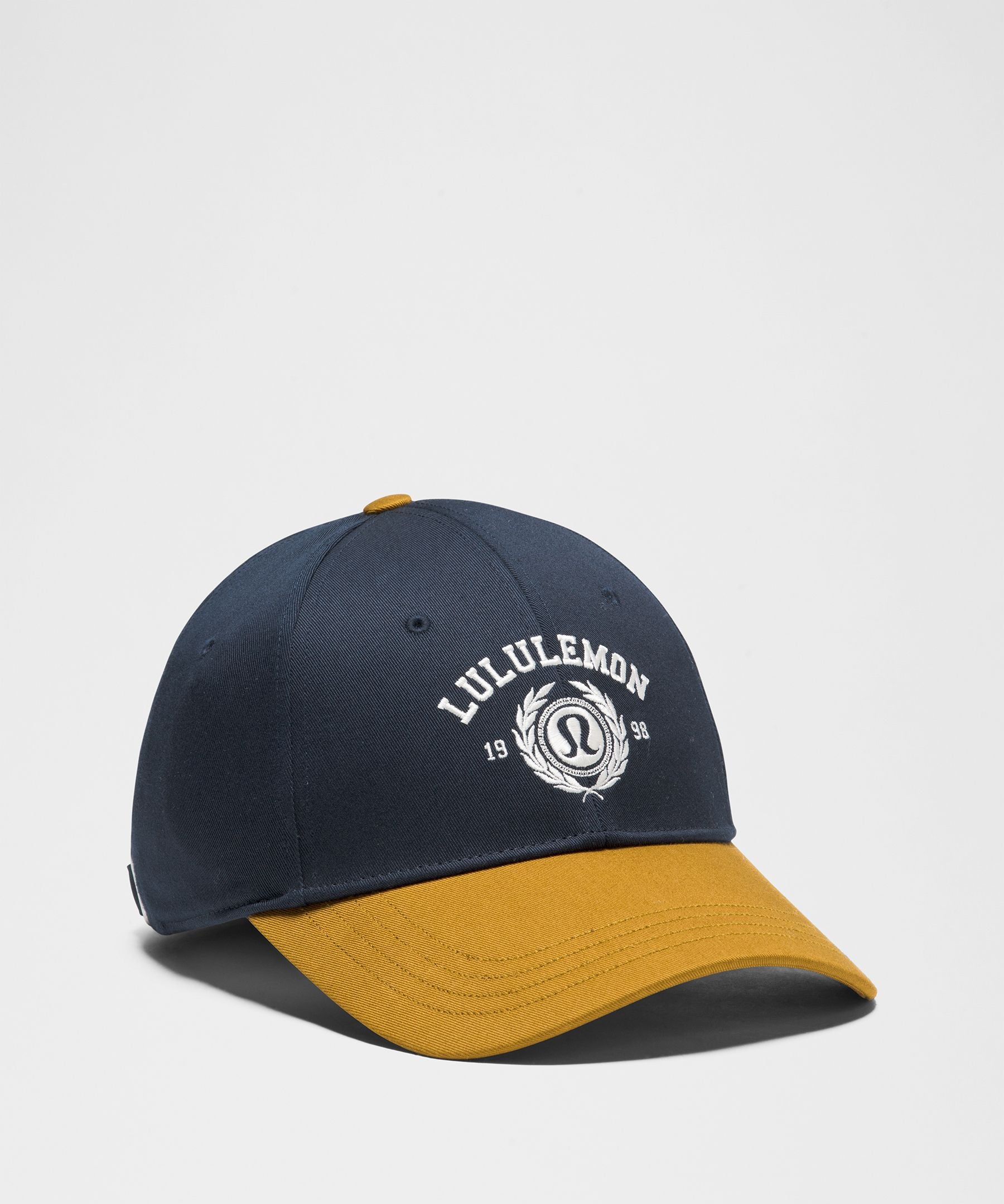 #color_true-navy/melrose-tan/light-ivory