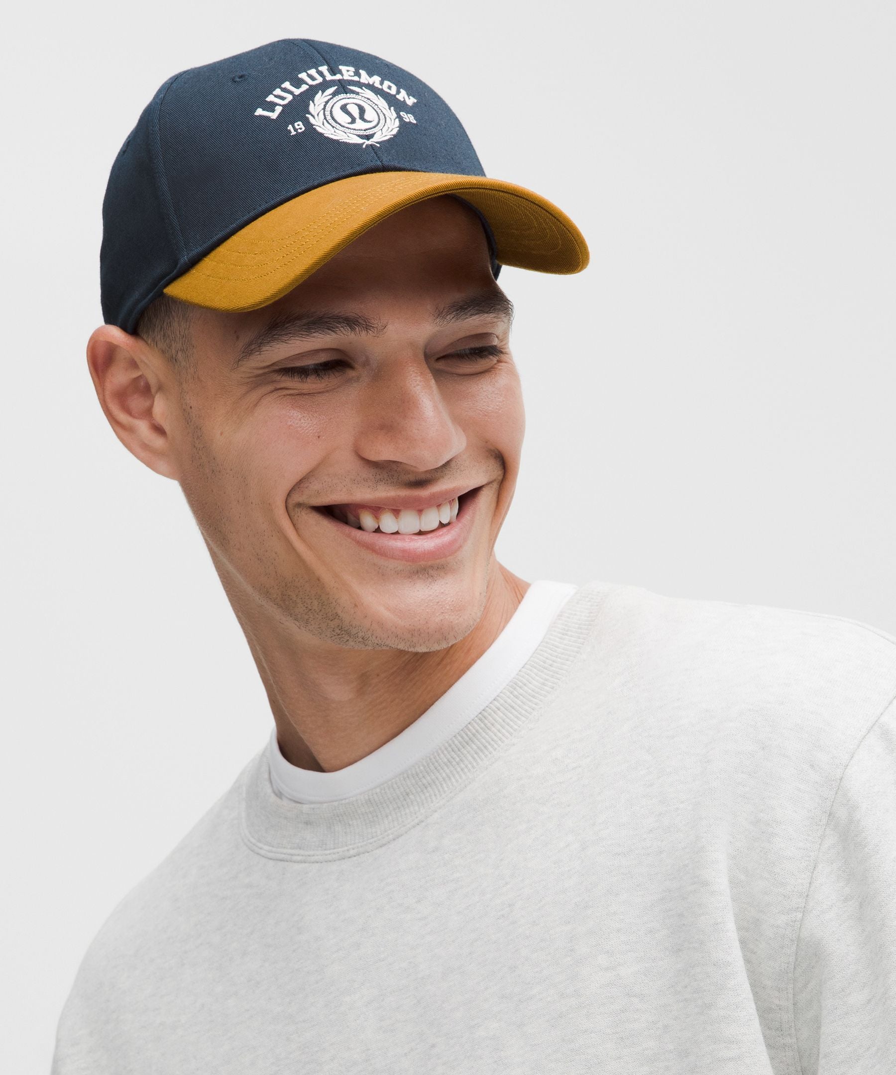 #color_true-navy/melrose-tan/light-ivory