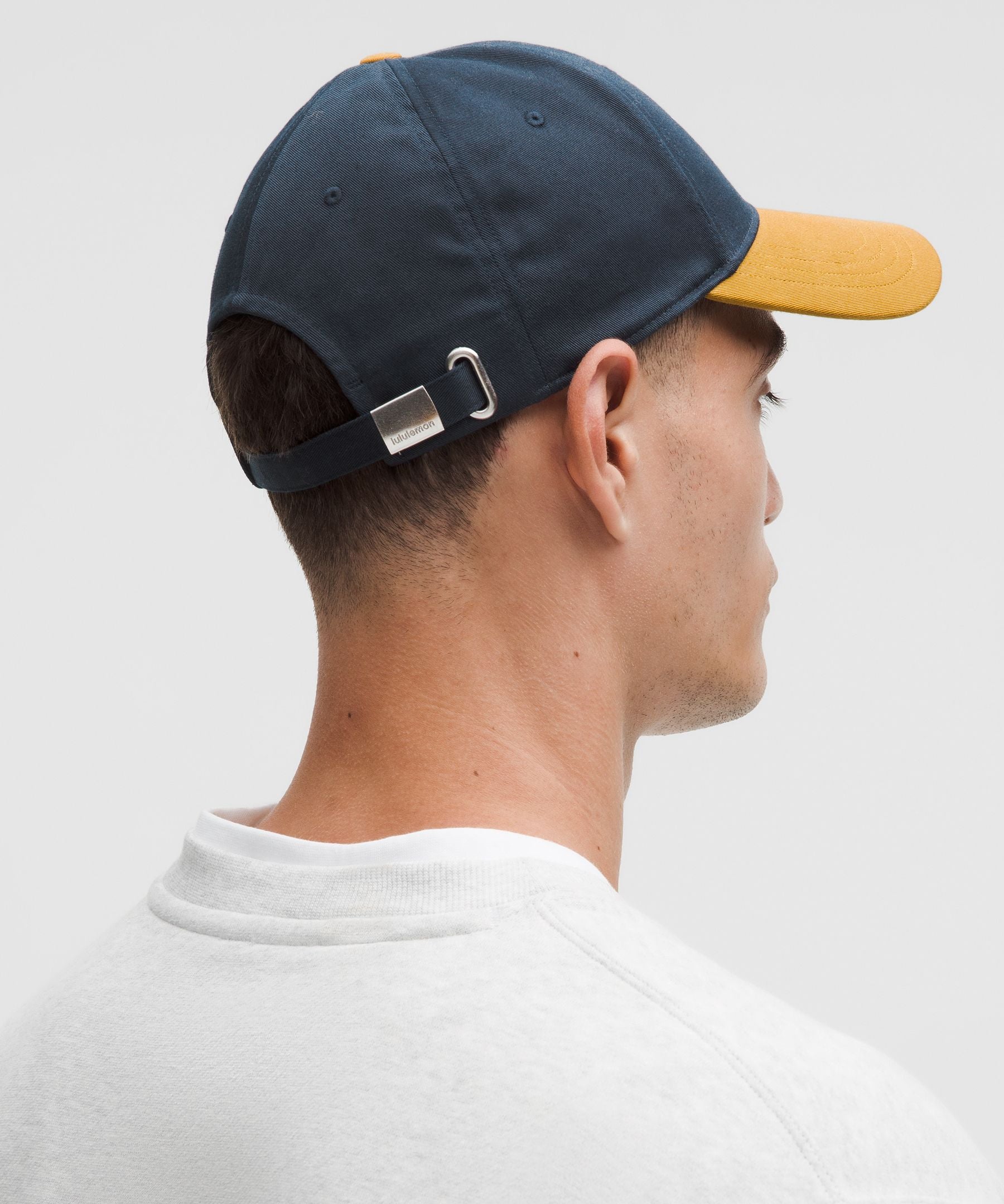 #color_true-navy/melrose-tan/light-ivory