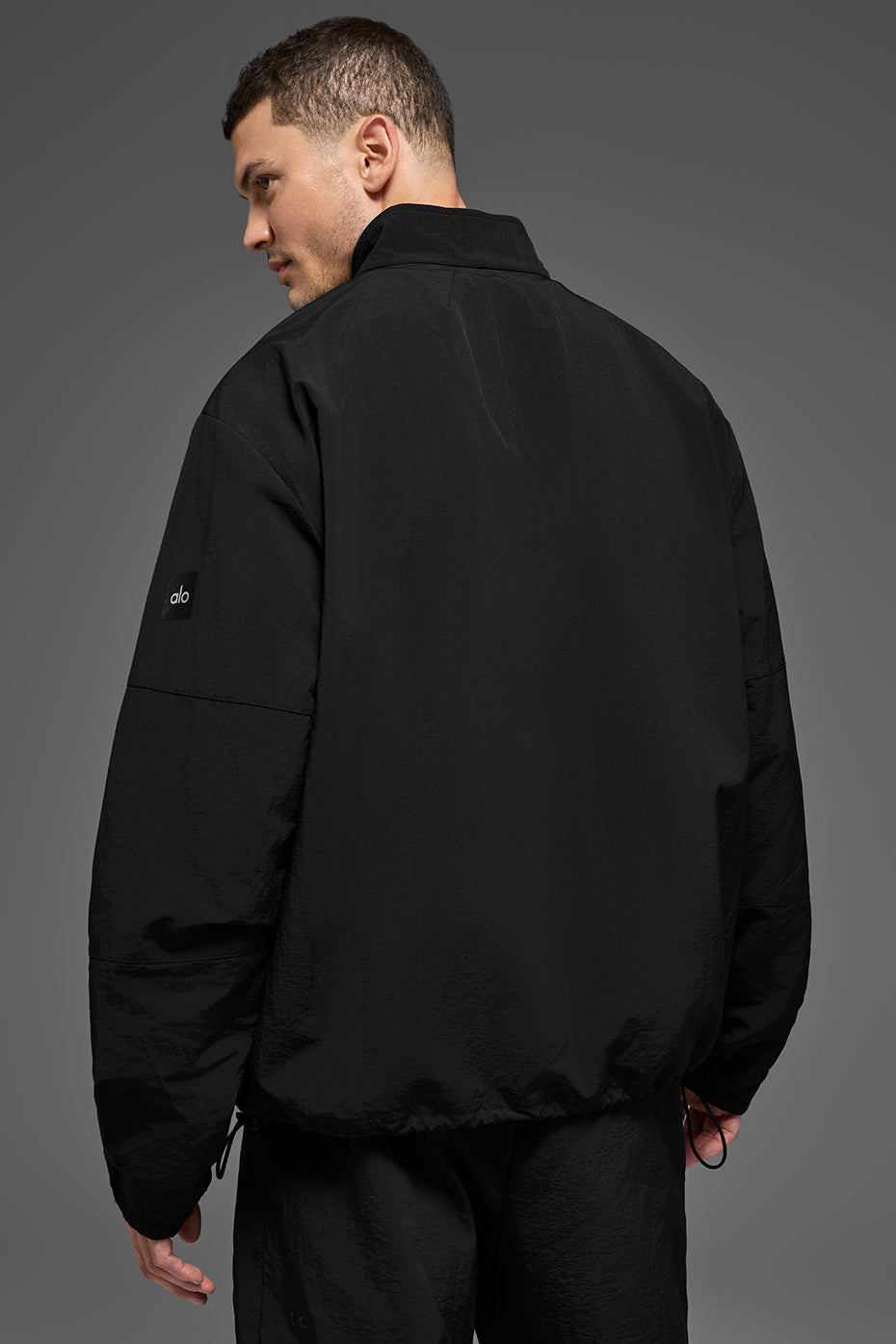 Alo Yoga Light Weight Takeaway Track Pullover