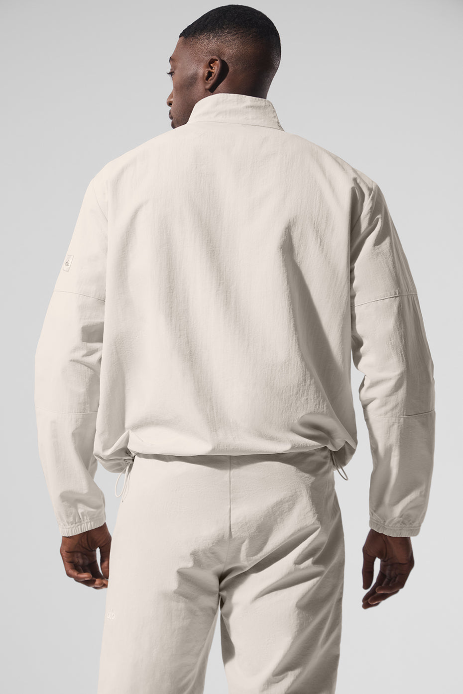 Alo Yoga Light Weight Takeaway Track Pullover