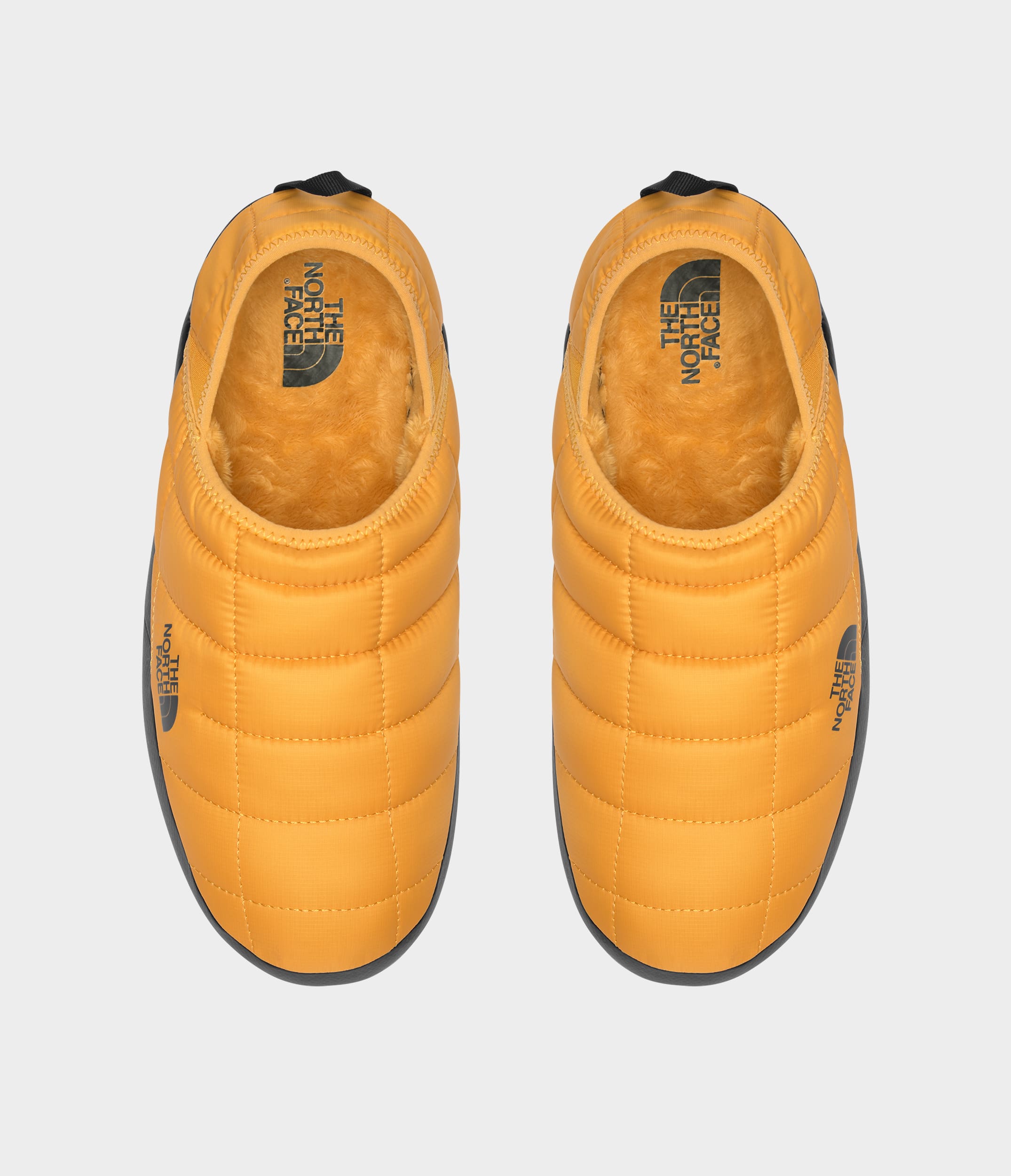 The North Face Mens Thermoball Traction Mules V Summit Gold Summit Gold