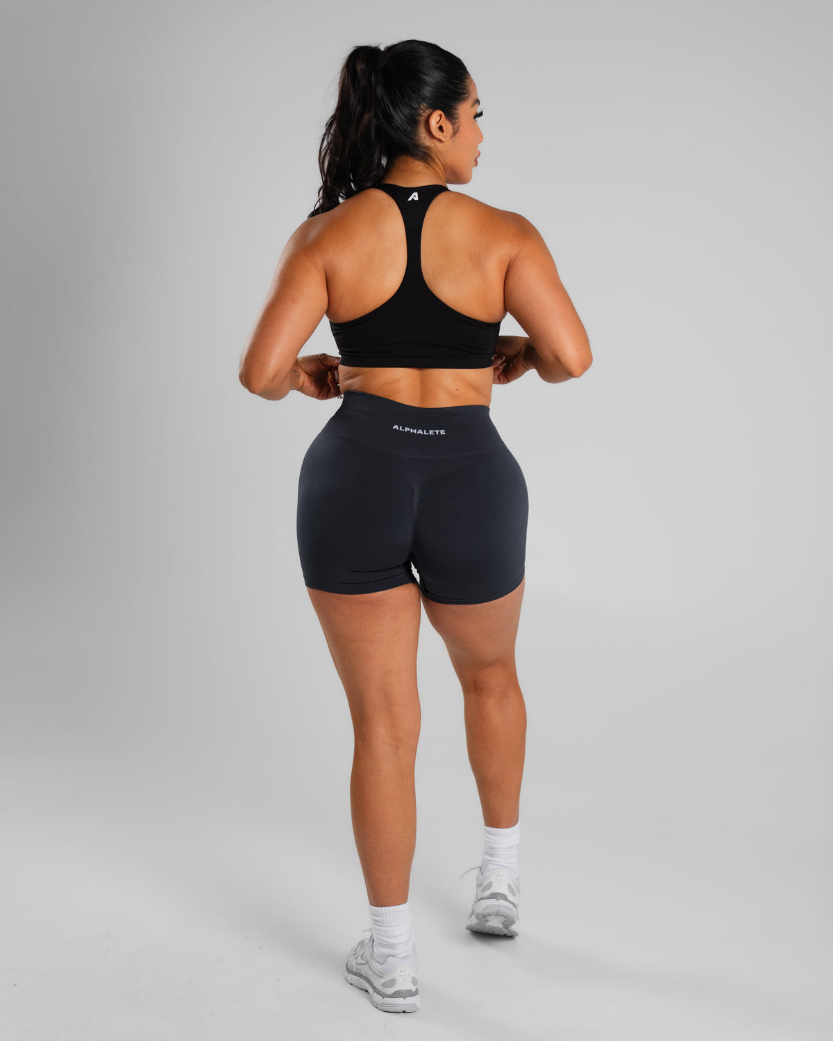 Alphalete Women's Amplify Mid Rise Short