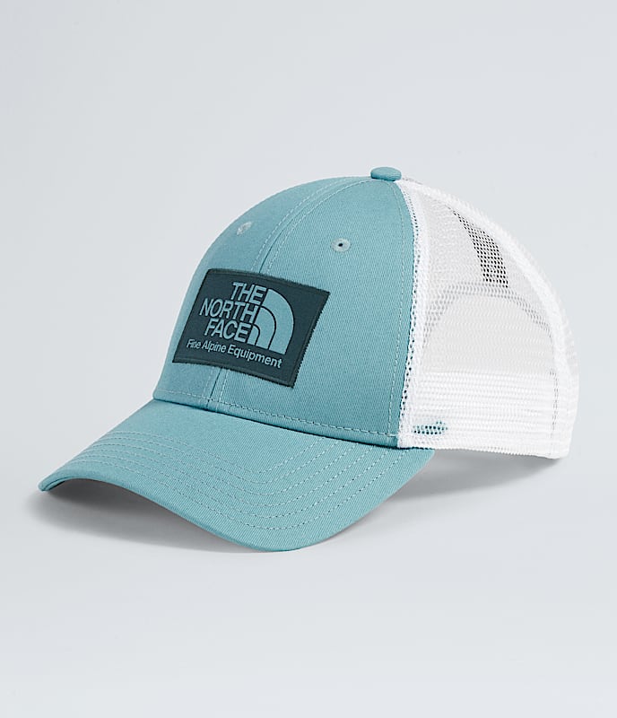 The North Face Mudder Trucker Hat TNF Black/TNF White/TNF Black TNF Camo Small Print Utility Brown/TNF Black Gravel TNF Black/TNF Medium Grey Heather Smokey Brown/Mocha Brow Shady Blue Hunter Green/White Dune Bark Mist/Burnt Umber BLUE ECLIPSE/SPACE