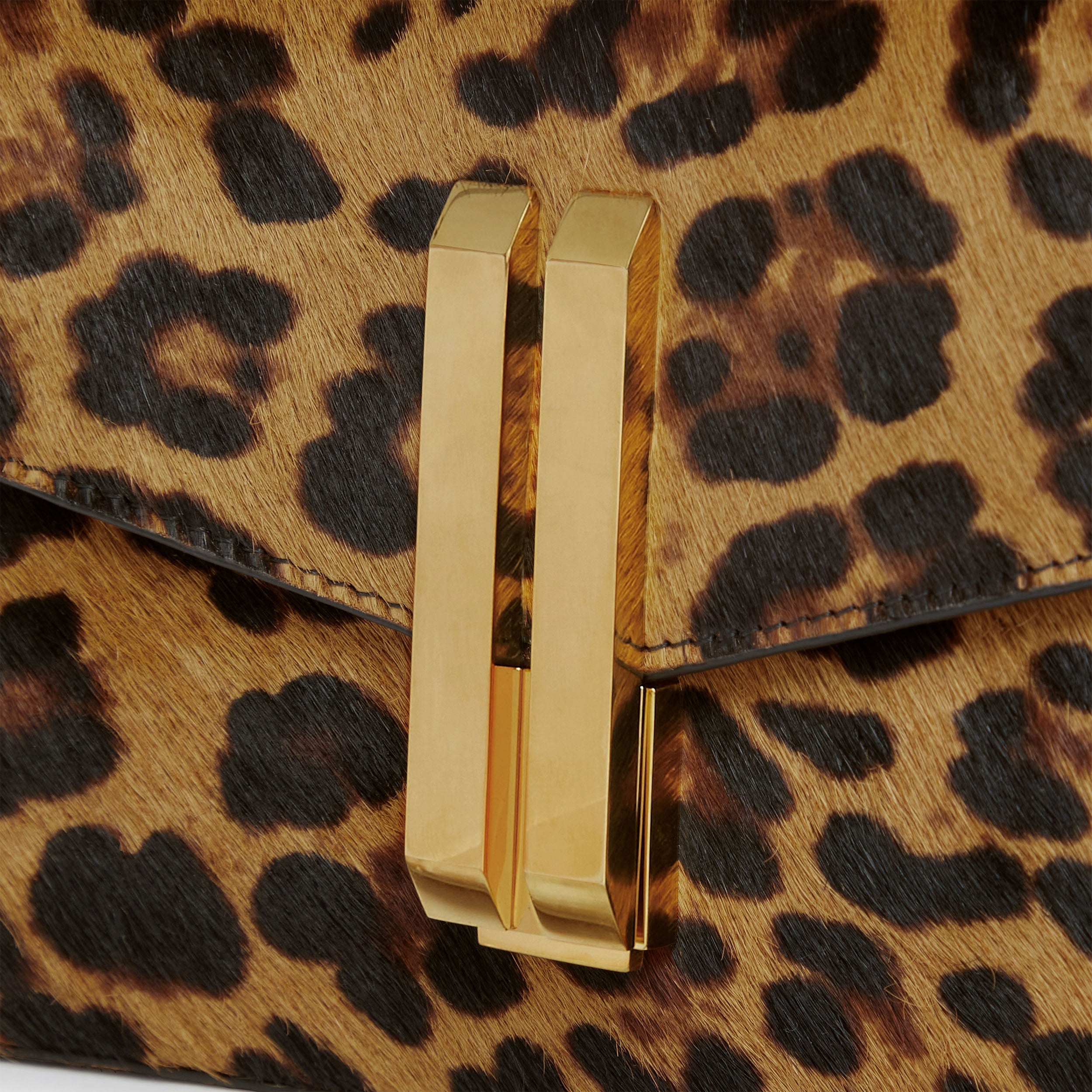 DeMellier The Vancouver Clutch leopard-effect calf hair & black smooth