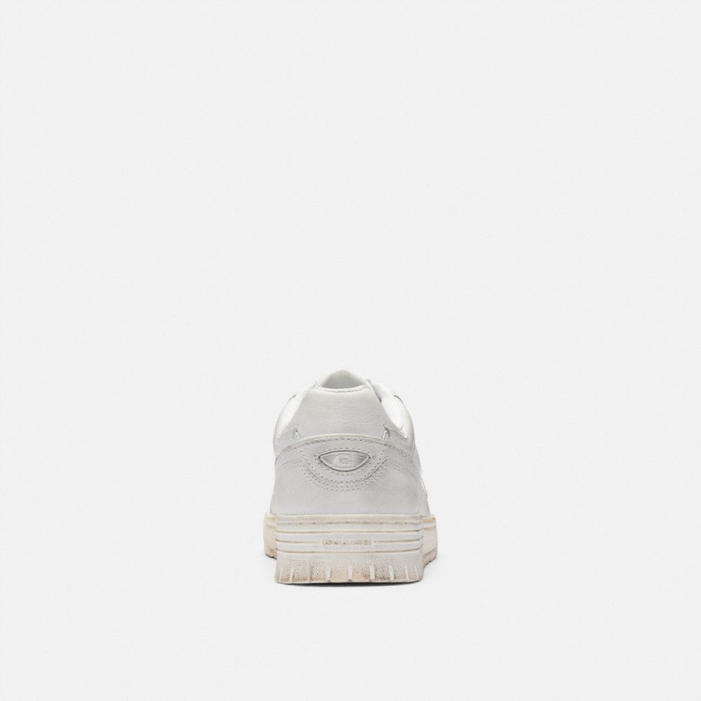 Women's Coach Soho Sneaker In Loved Leather White