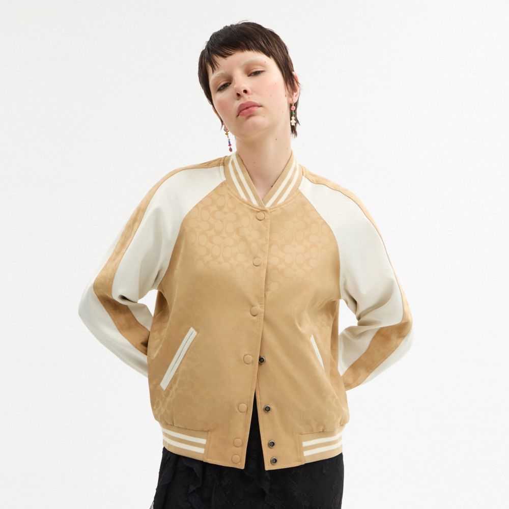 Coach Reversible Signature Souvenir Varsity Jacket Beige