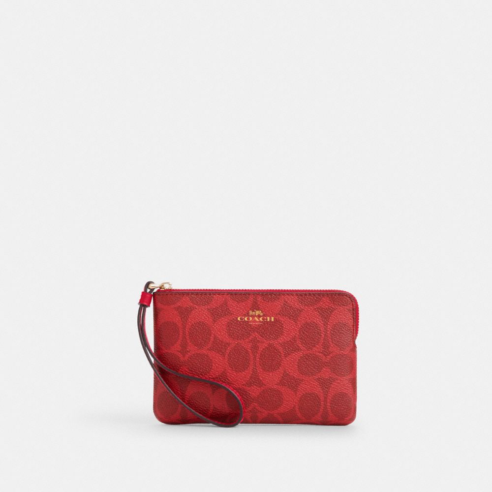 Coach Corner Zip Wristlet In Signature Canvas Gold Bold Red