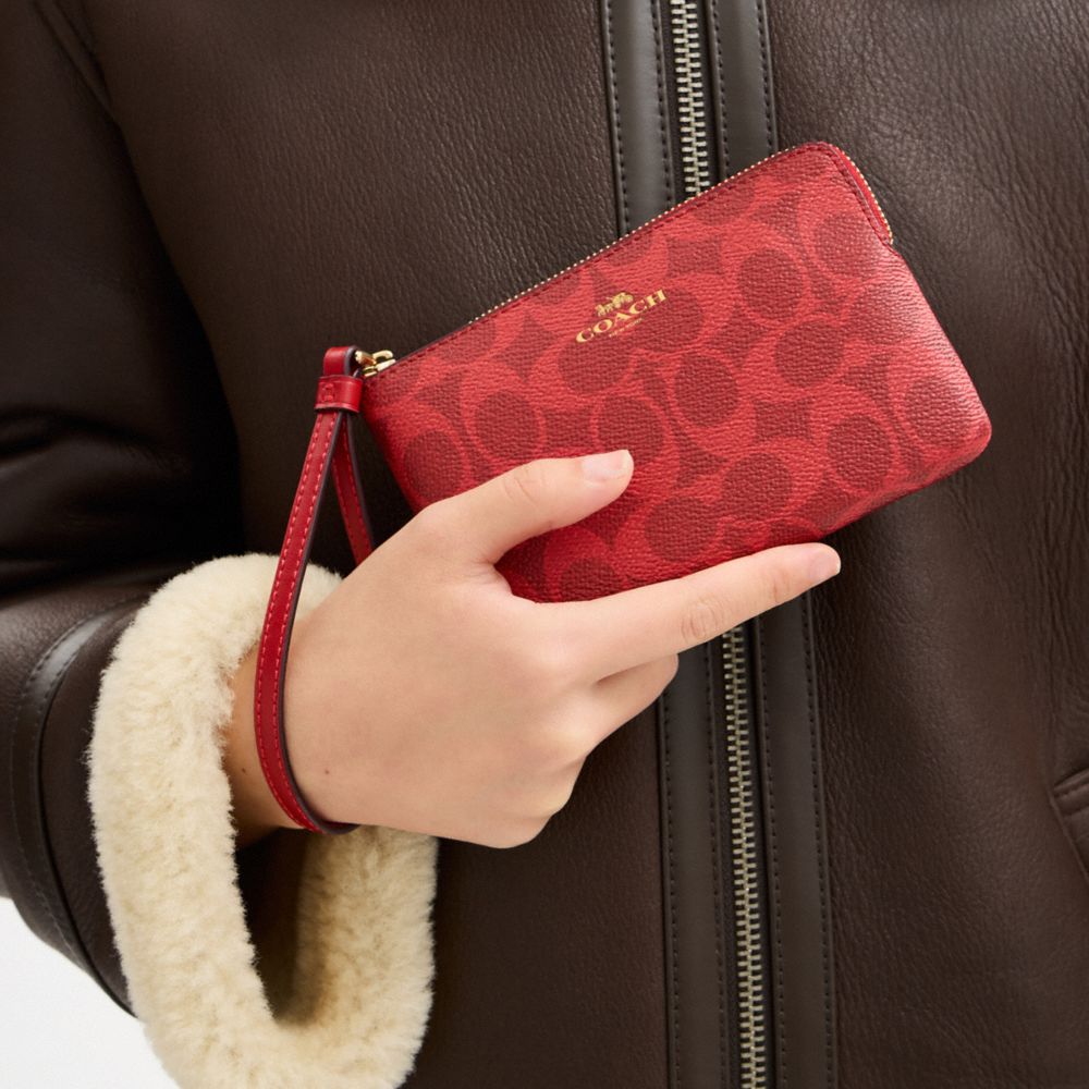 Coach Corner Zip Wristlet In Signature Canvas Gold Bold Red
